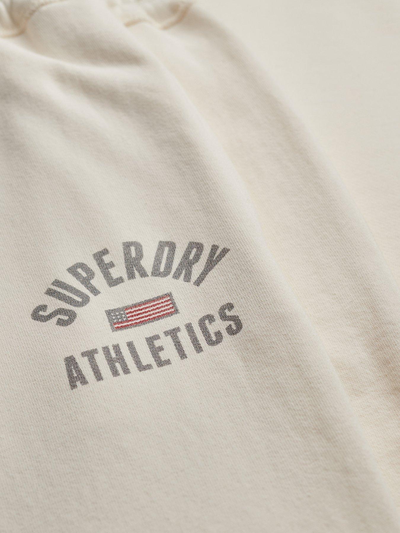 Image 7 of 7 of Superdry Athletic Print Flare Joggers - Cream