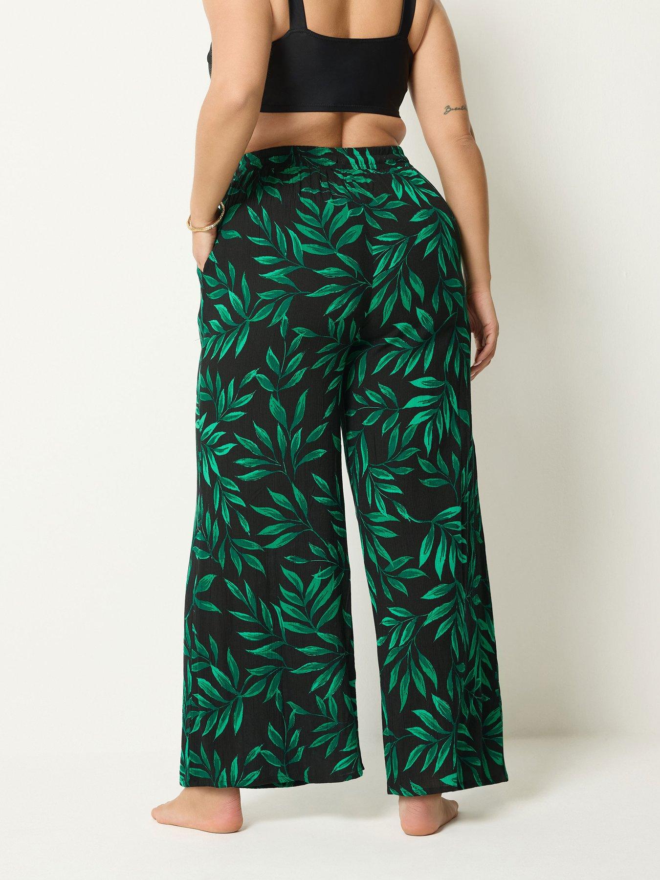Image 2 of 4 of Yours Curve Leaf Print Wide Leg Crinkle Trousers - Black