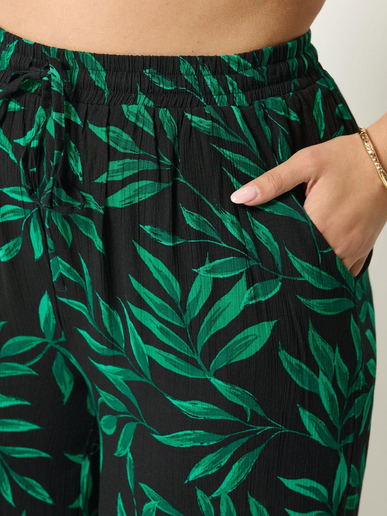 Image 4 of 4 of Yours Curve Leaf Print Wide Leg Crinkle Trousers - Black