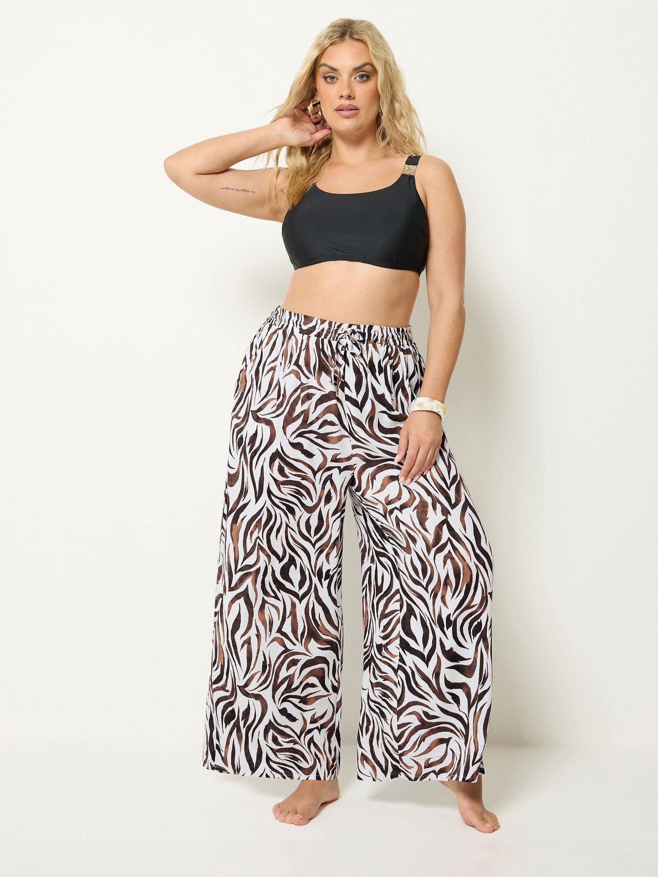 Image 1 of 4 of Yours Curve Zebra Print Wide Leg Crinkle Trousers Co-Ord - Brown