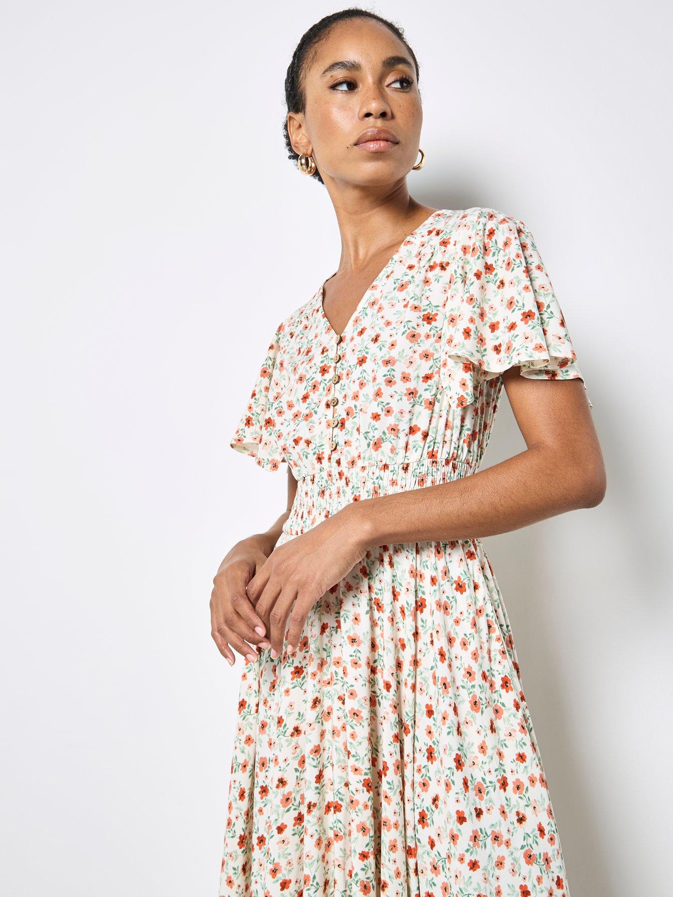 Image 5 of 5 of Apricot Painterly Floral Ditsy In Coconut Button Angel Sleeve Dress - Cream