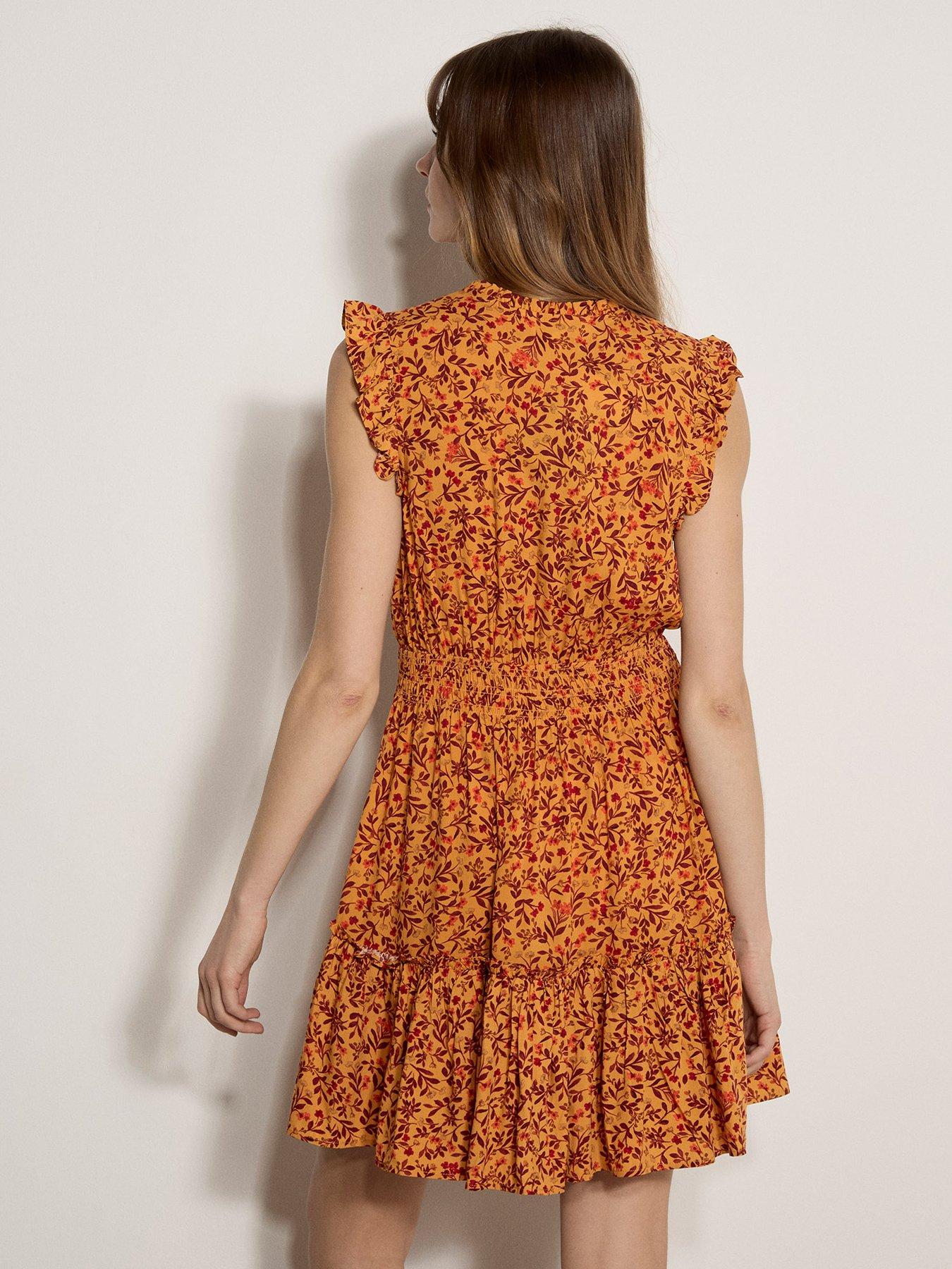 Image 2 of 4 of Apricot Ruffle Tiered Ditsy Mini Dress