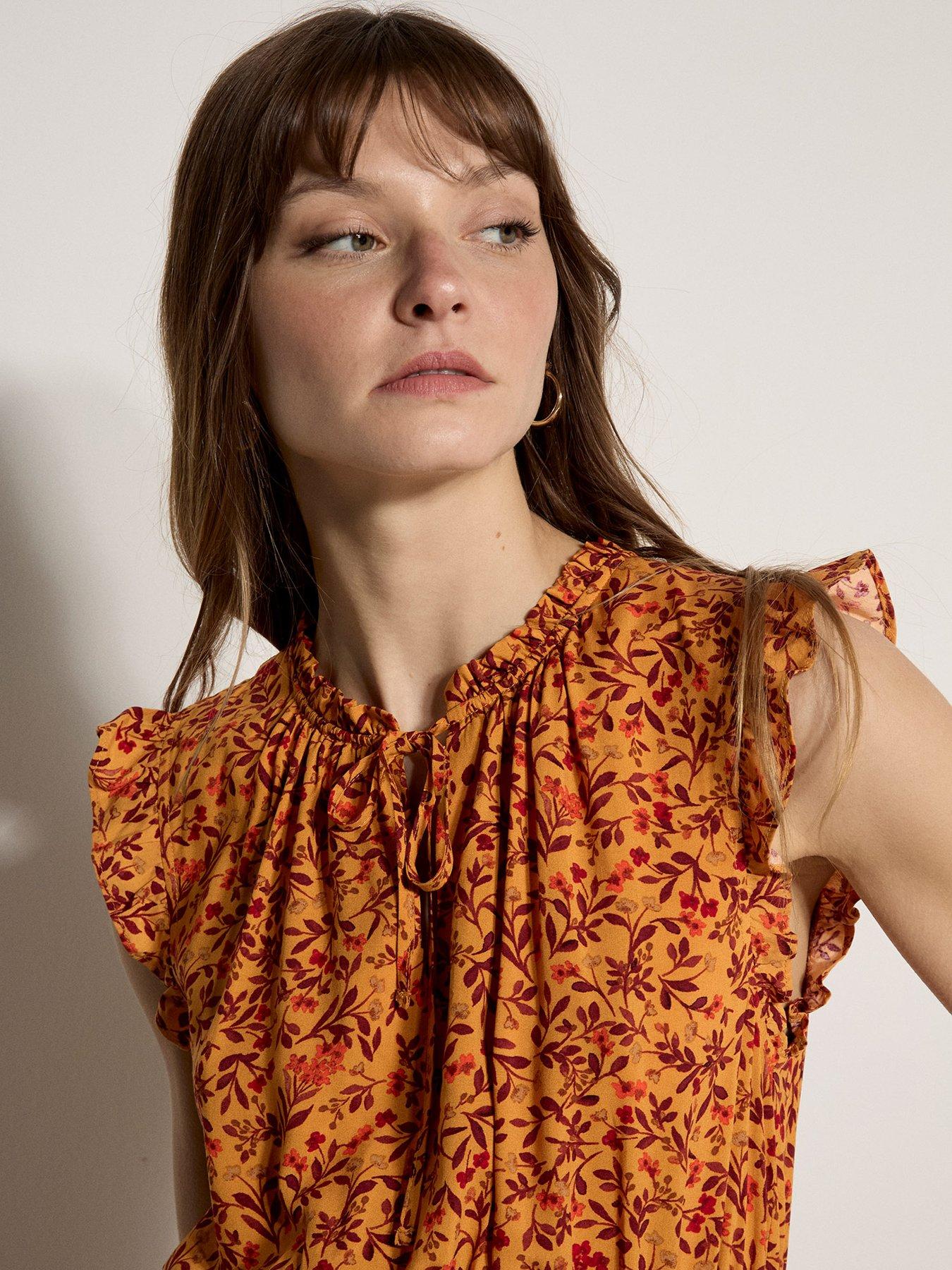 Image 3 of 4 of Apricot Ruffle Tiered Ditsy Mini Dress