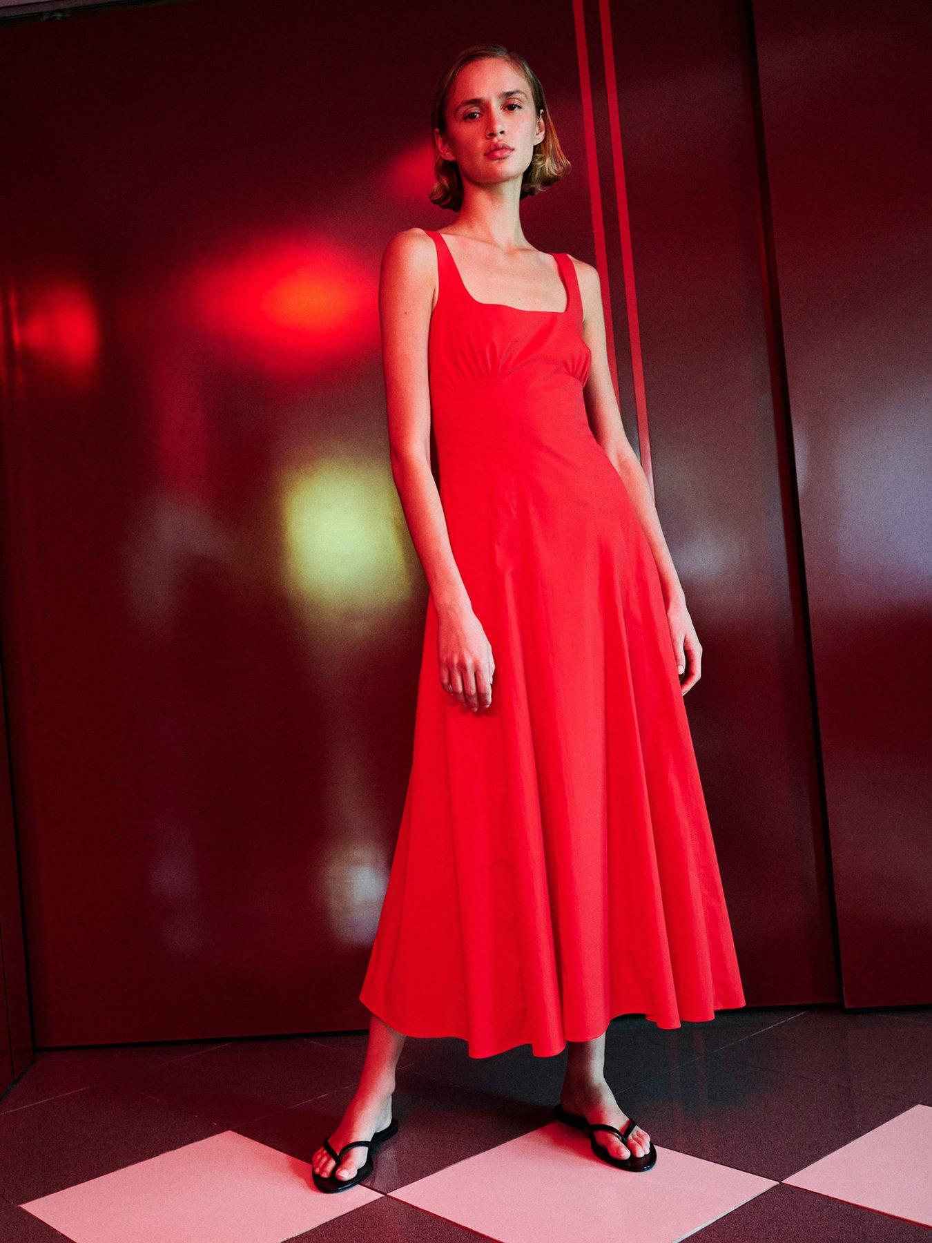 Image 1 of 6 of Mango Starring Hailey Bieber Long Flared Dress - Red