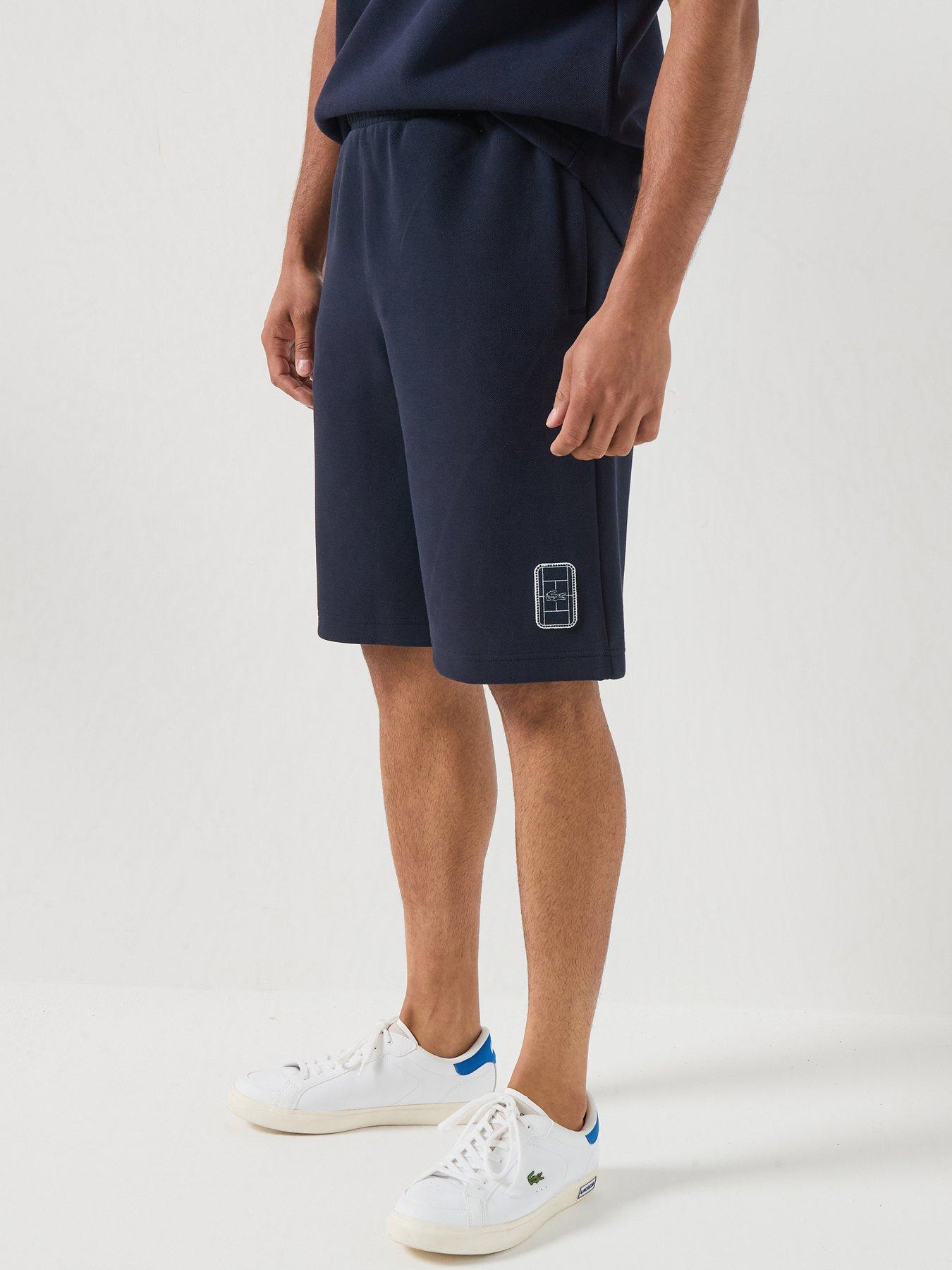 Image 1 of 6 of Lacoste Premium Embroidered Sweat Shorts - Navy