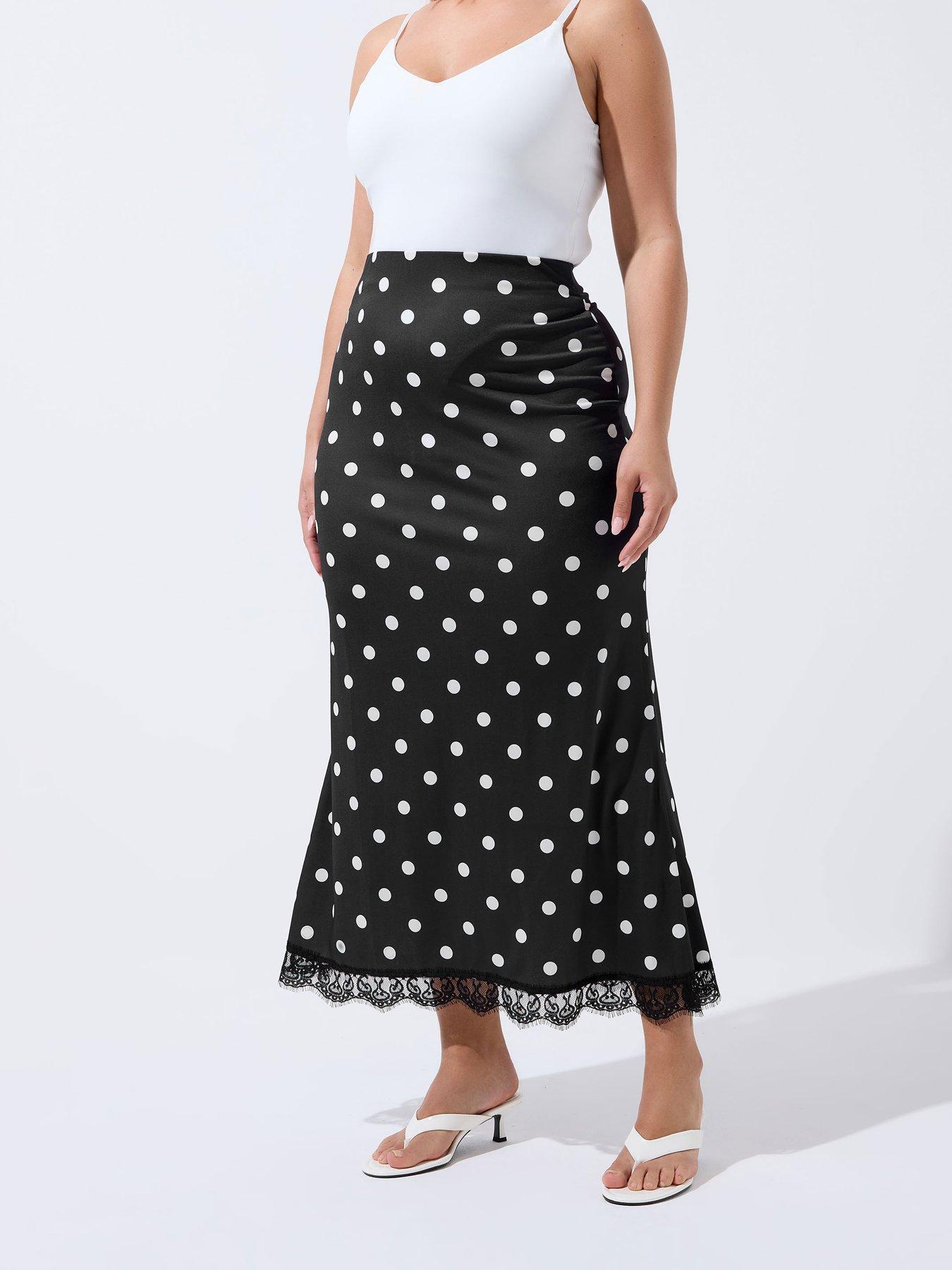 Image 1 of 4 of Yours Curve Polka Dot Lace Hem Maxi Skirt - Black