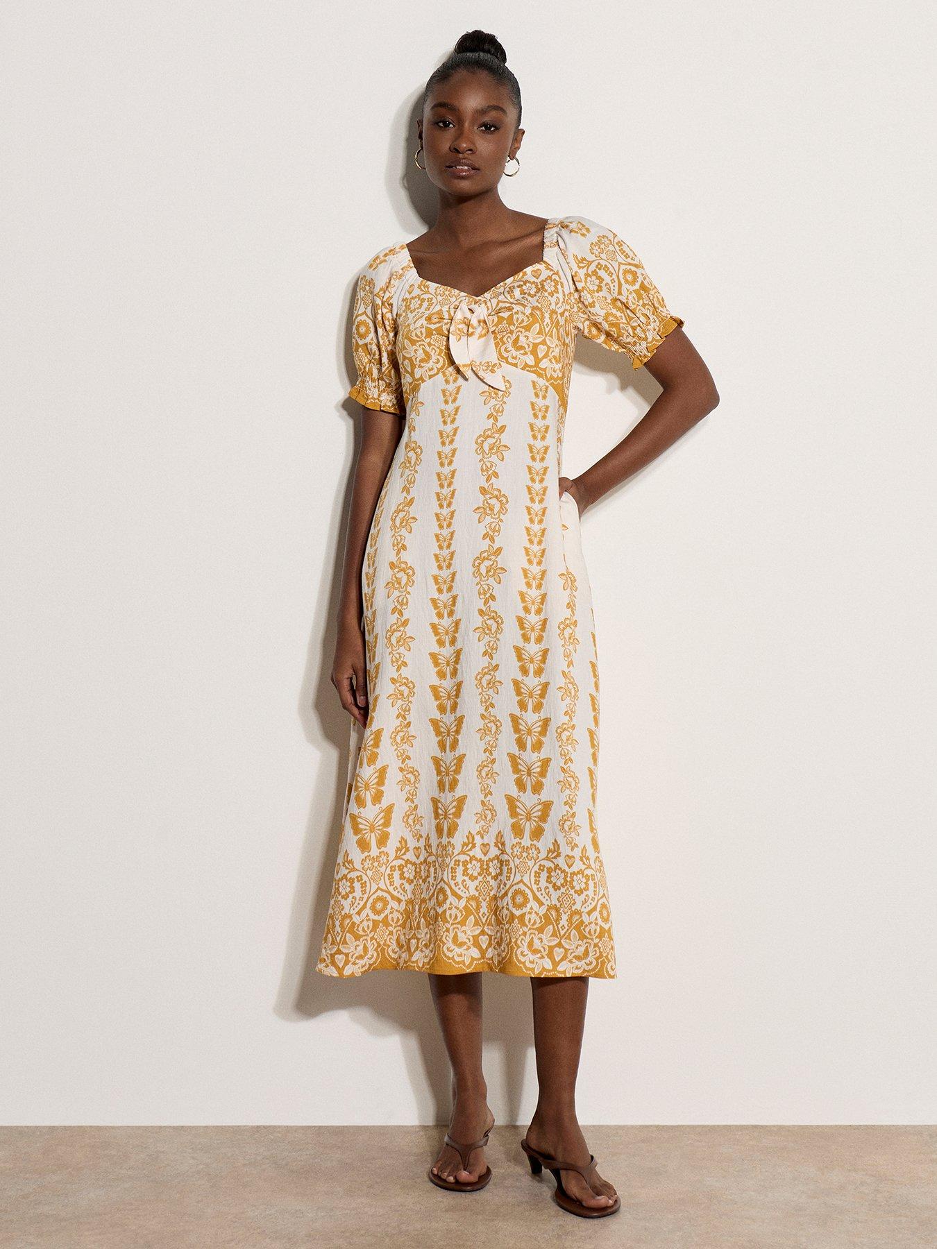 Image 1 of 4 of Apricot Butterflies Border Print Midi Dress - Yellow
