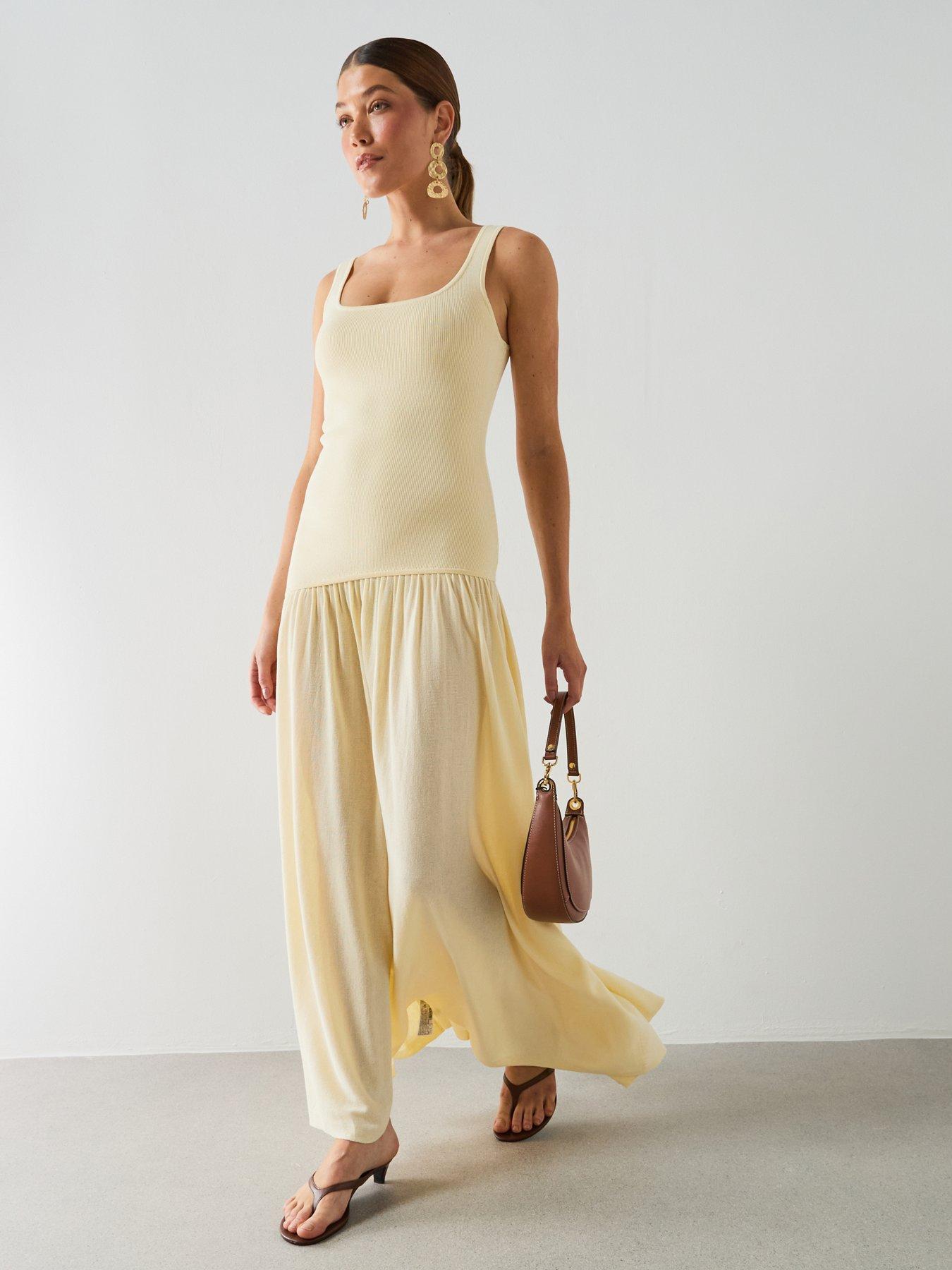 Image 1 of 6 of Mango Asymmetric Cut Knitted Dress - Yellow