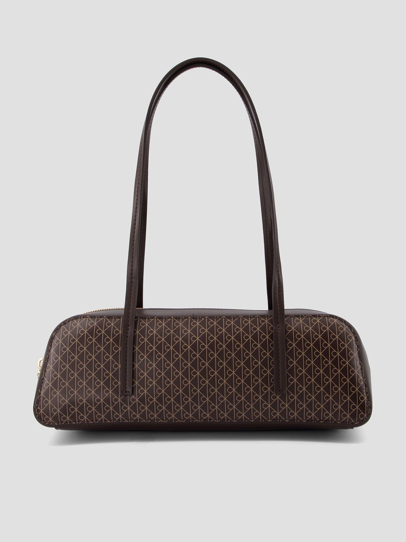 Image 1 of 4 of Calvin Klein Coated Emblem Print Barrel Bag - Brown
