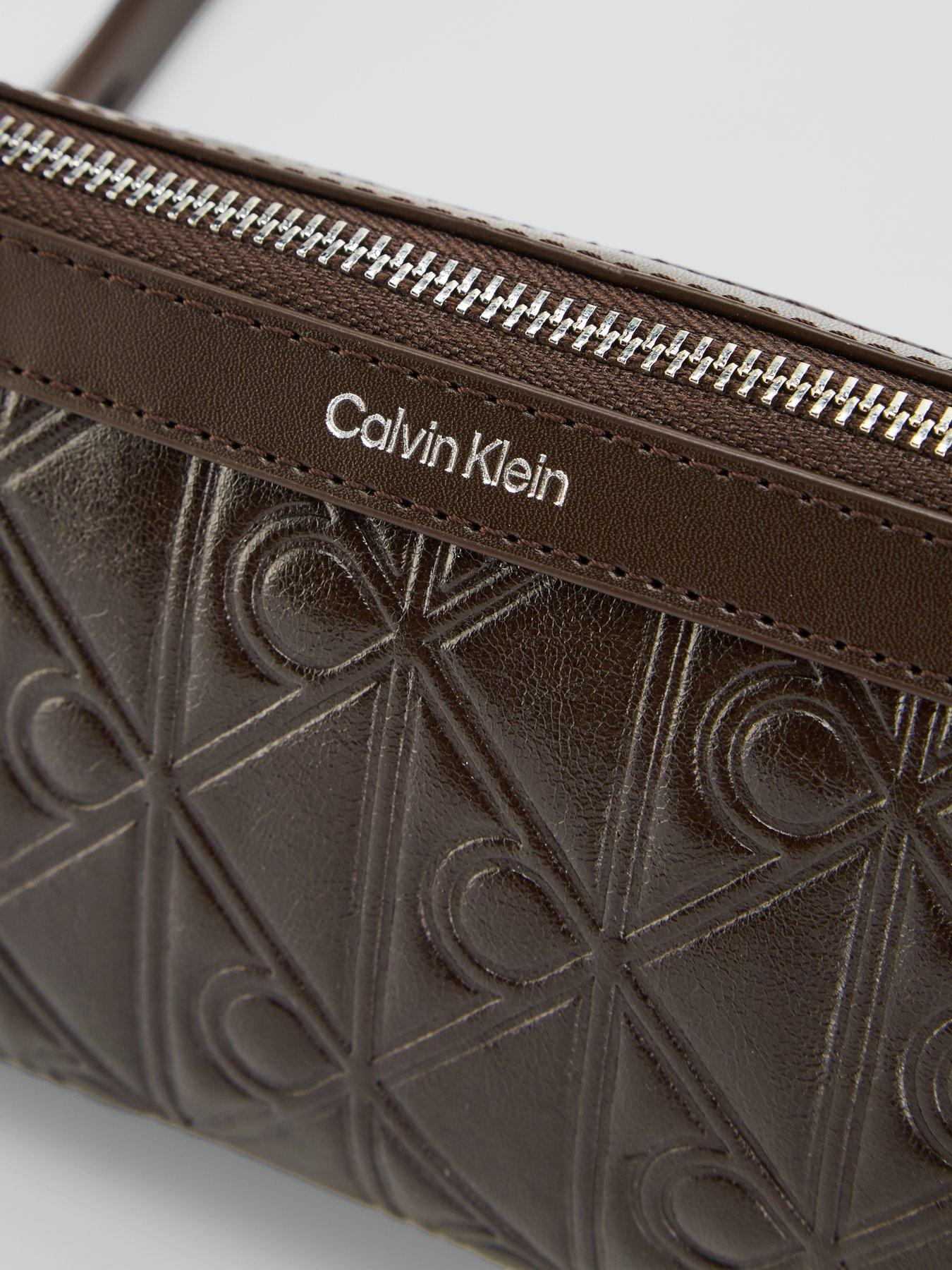 Image 4 of 5 of Calvin Klein Debossed Allover Emblem Logo Shoulder Bag - Brown