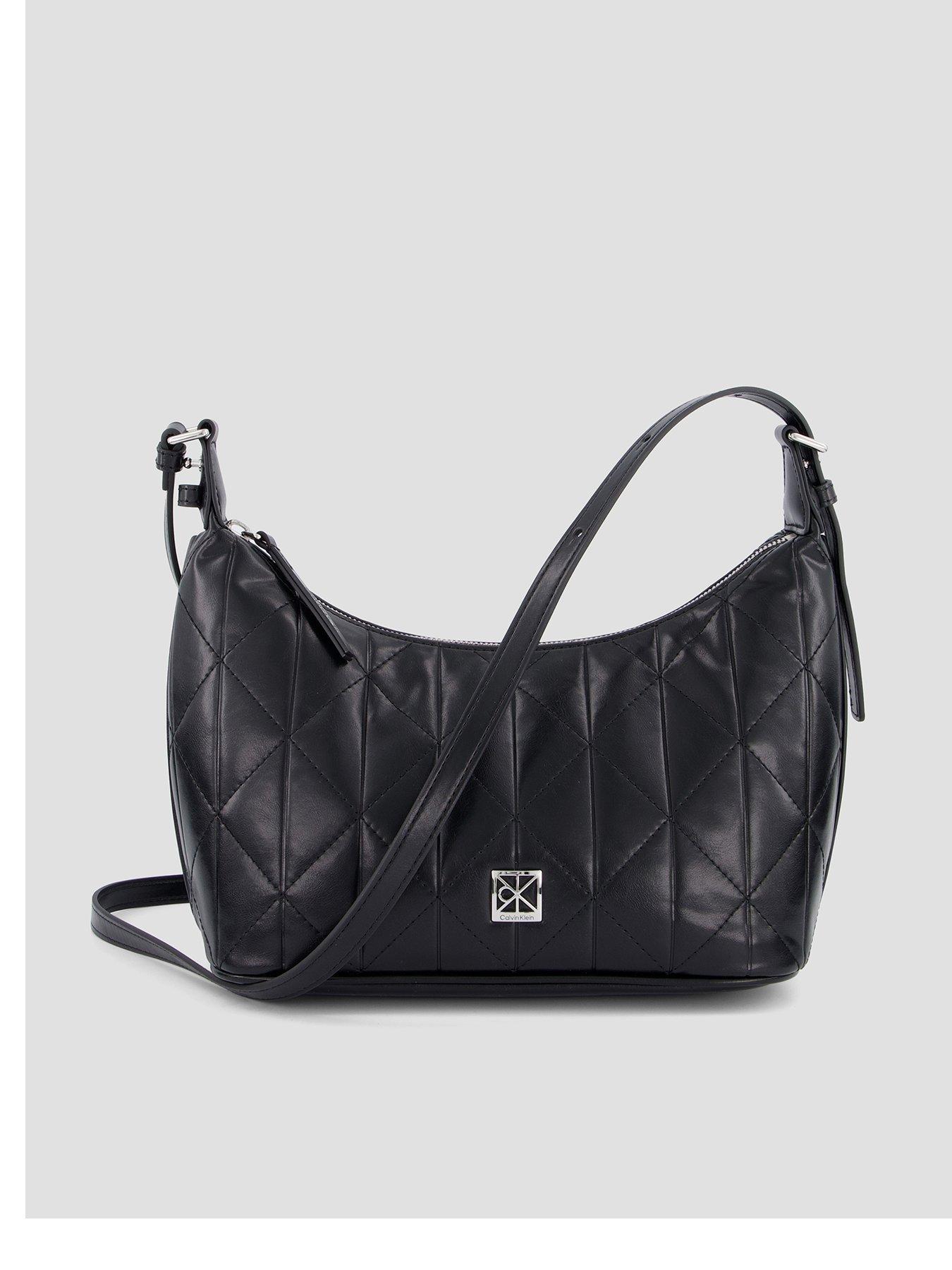 Image 1 of 4 of Calvin Klein Quilted Emblem Plaque Shoulder Bag - Black