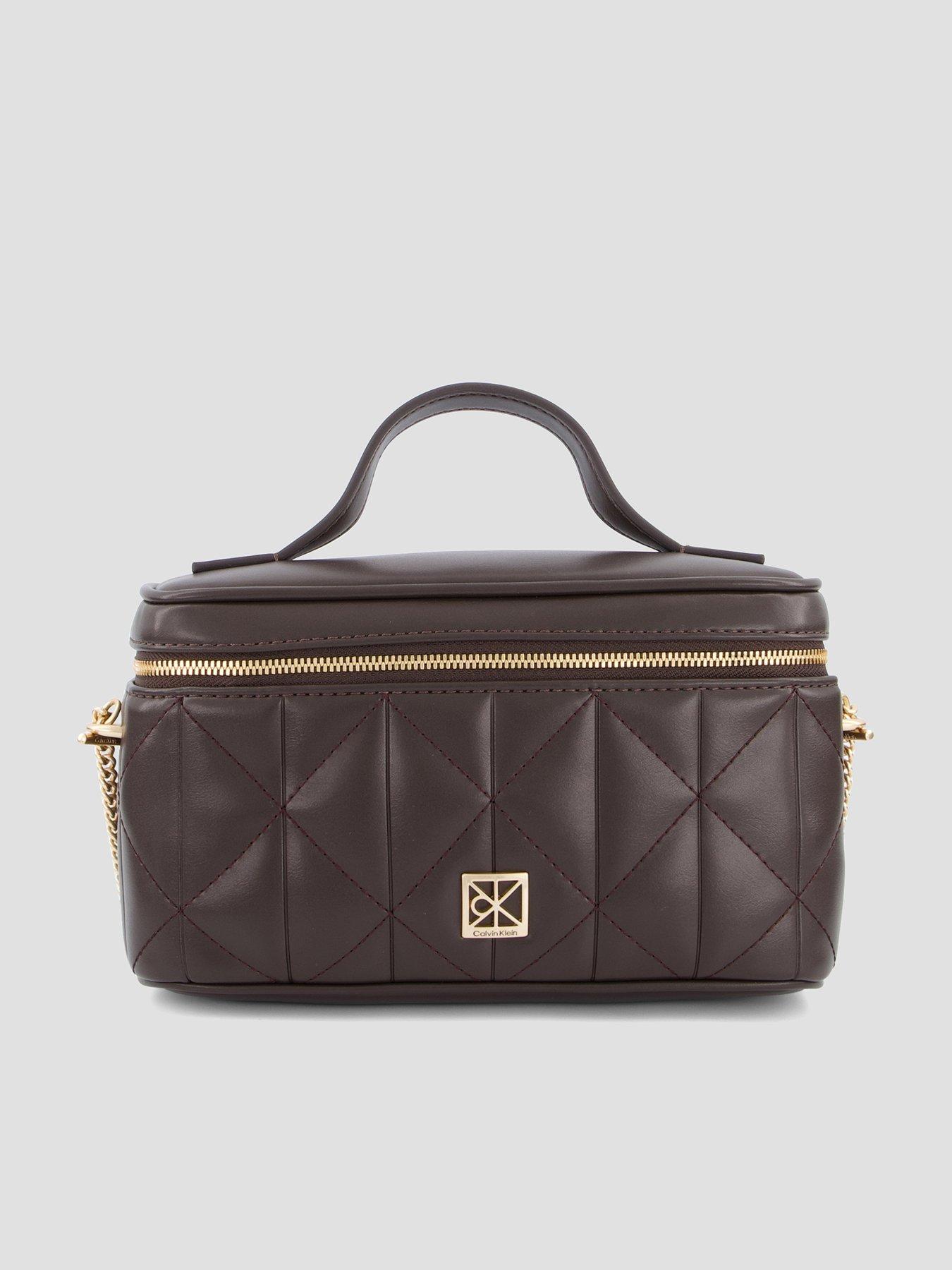 Image 1 of 5 of Calvin Klein Quilted Beauty Case - Brown