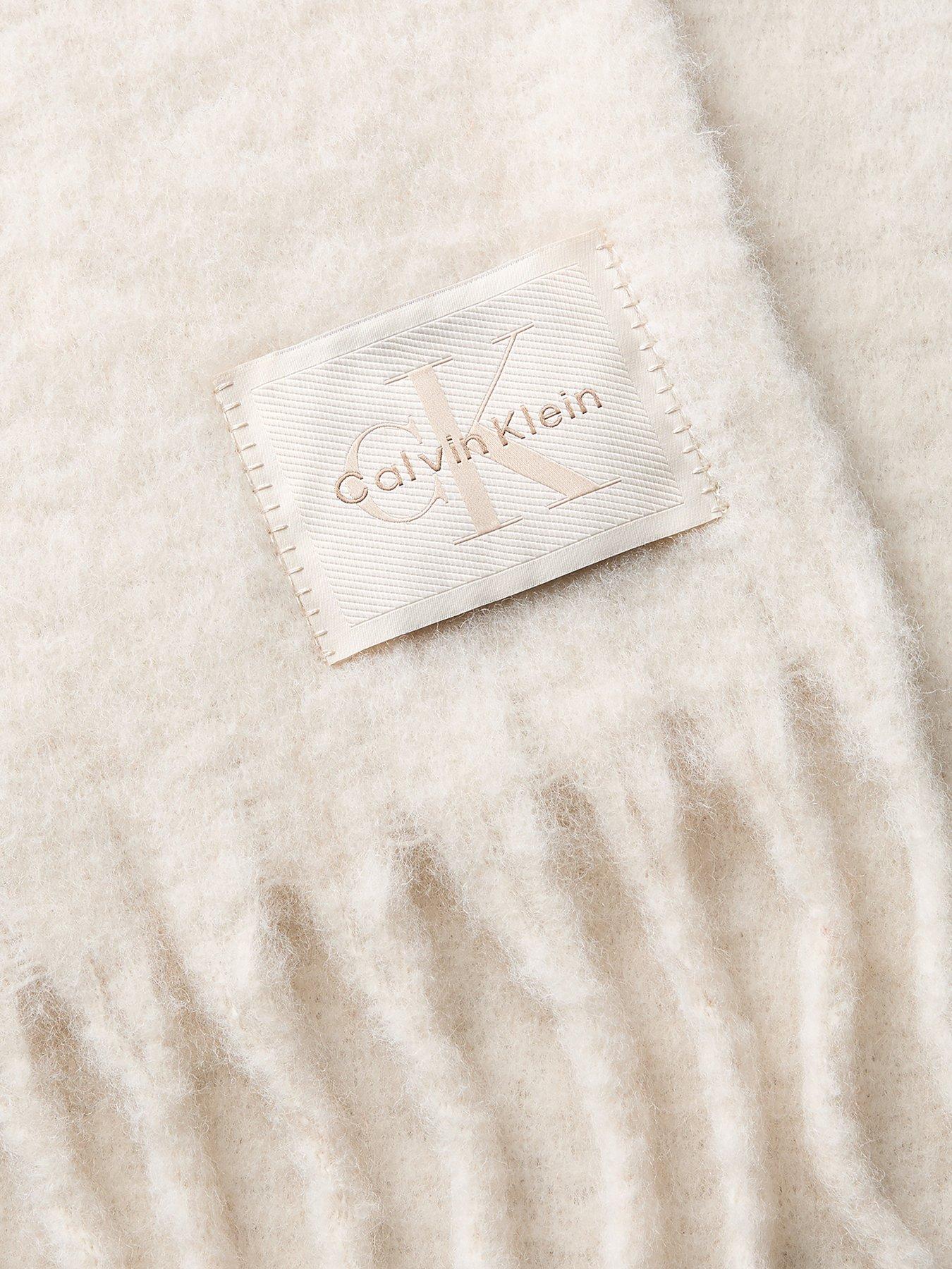 Image 2 of 3 of Calvin Klein Brushed Solid Hardware Scarf - Beige