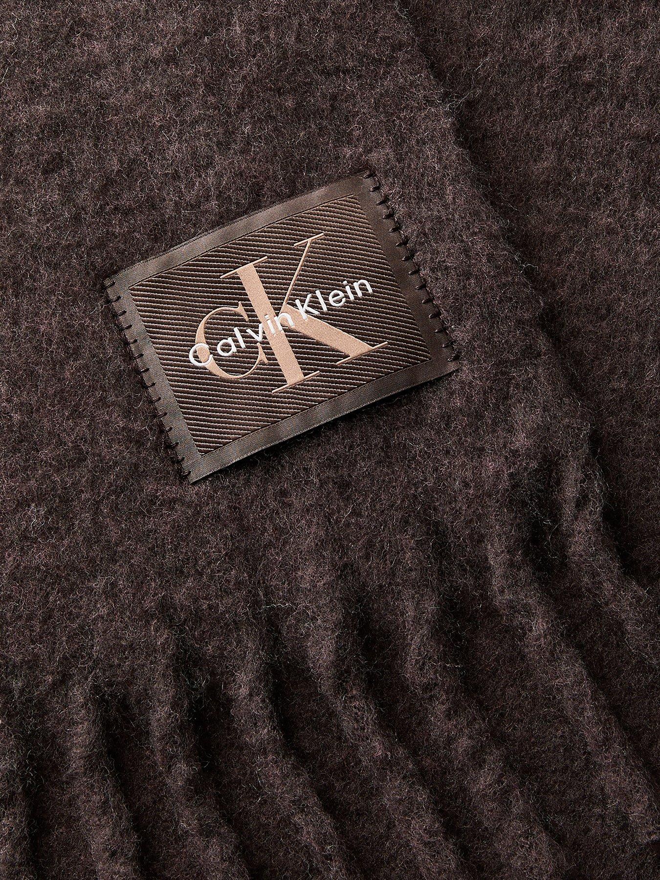 Image 2 of 3 of Calvin Klein Brushed Solid Hardware Scarf - Brown