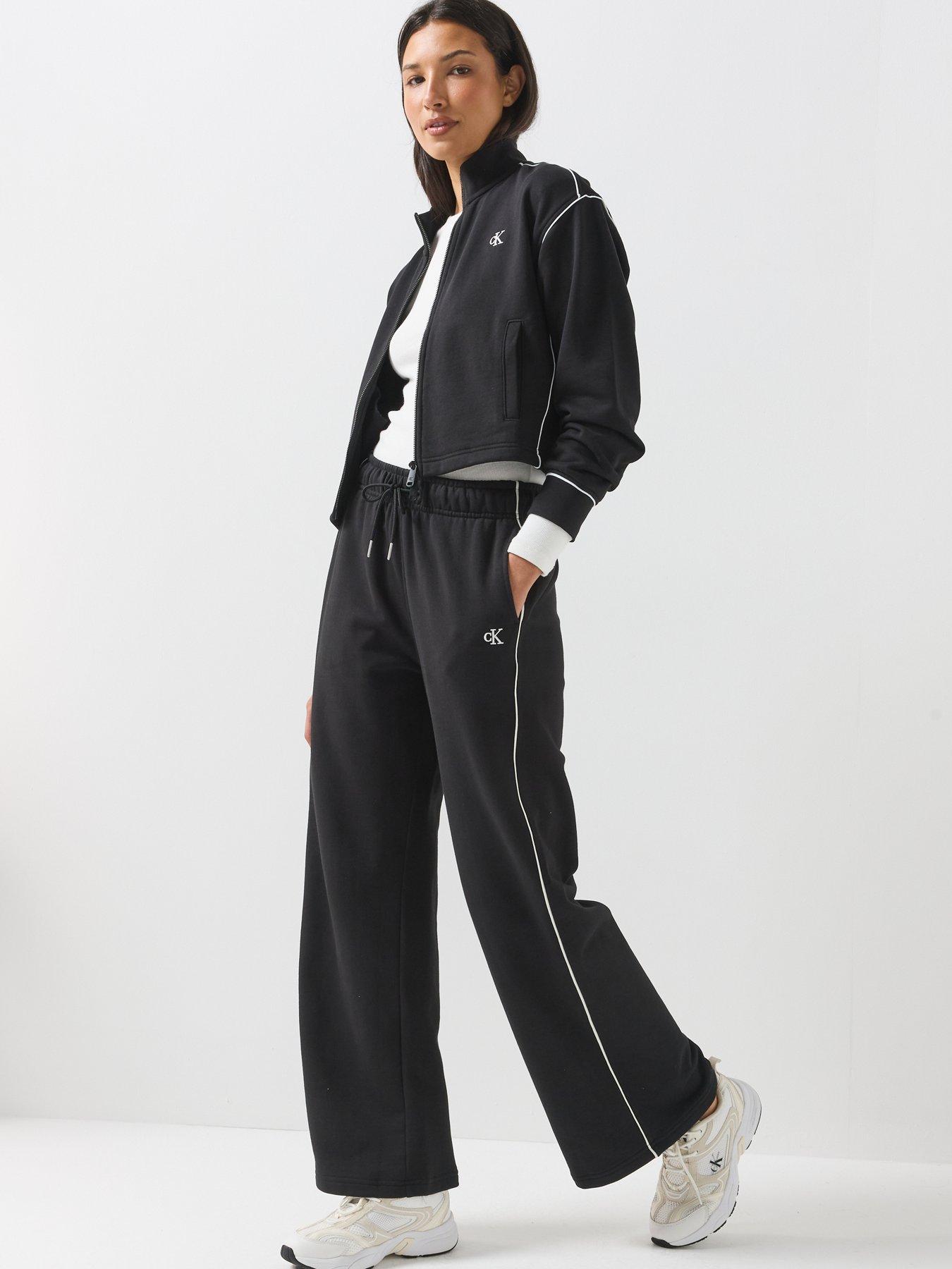 Image 5 of 6 of Calvin Klein Jeans Jeans Monogram Embroidery Contrast Piping Terry Joggers - Black