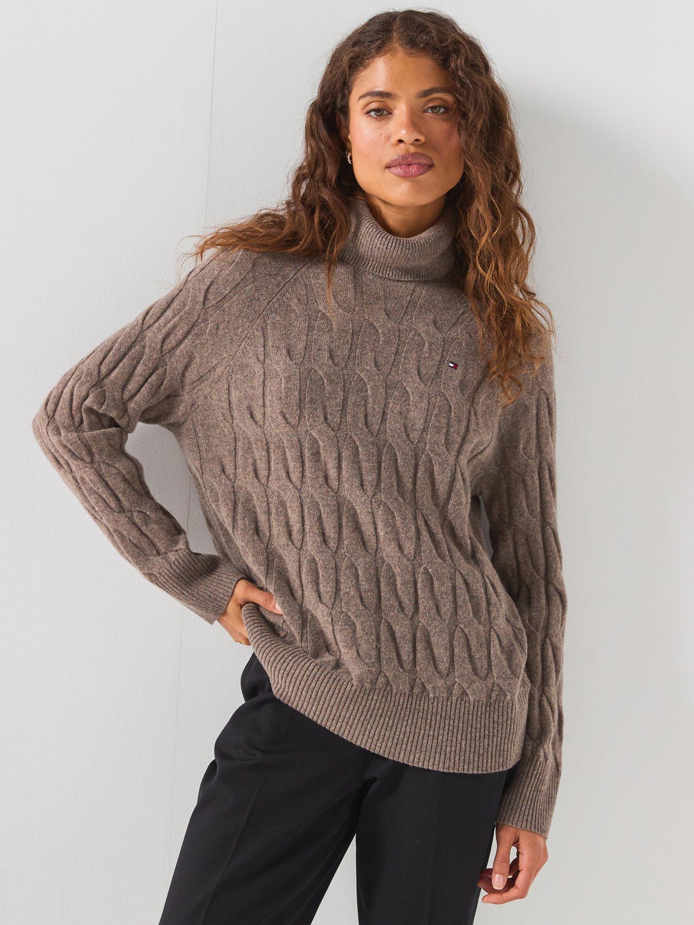 Image 1 of 6 of Tommy Hilfiger Pure Wool Cable Roll Neck Jumper - Brown