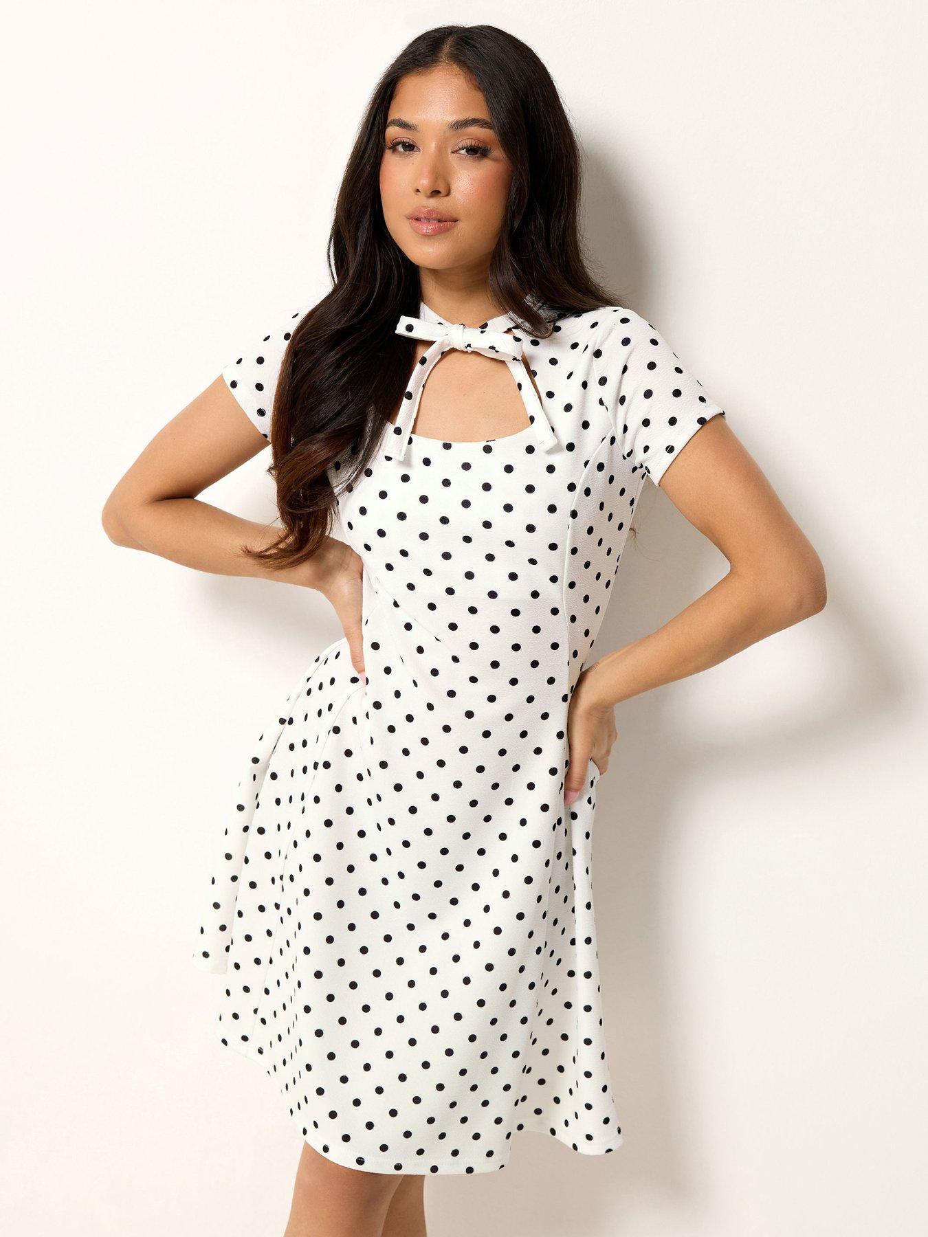 Image 1 of 4 of PixieGirl Petite Polka Dot Tie Front Mini Dress - White