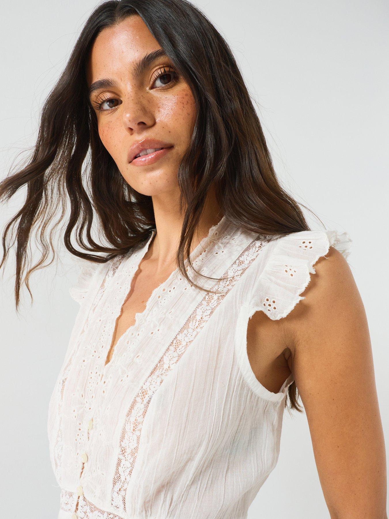 Image 6 of 6 of FREE PEOPLE Embroidered Peplum Button-Front Cotton Top - White