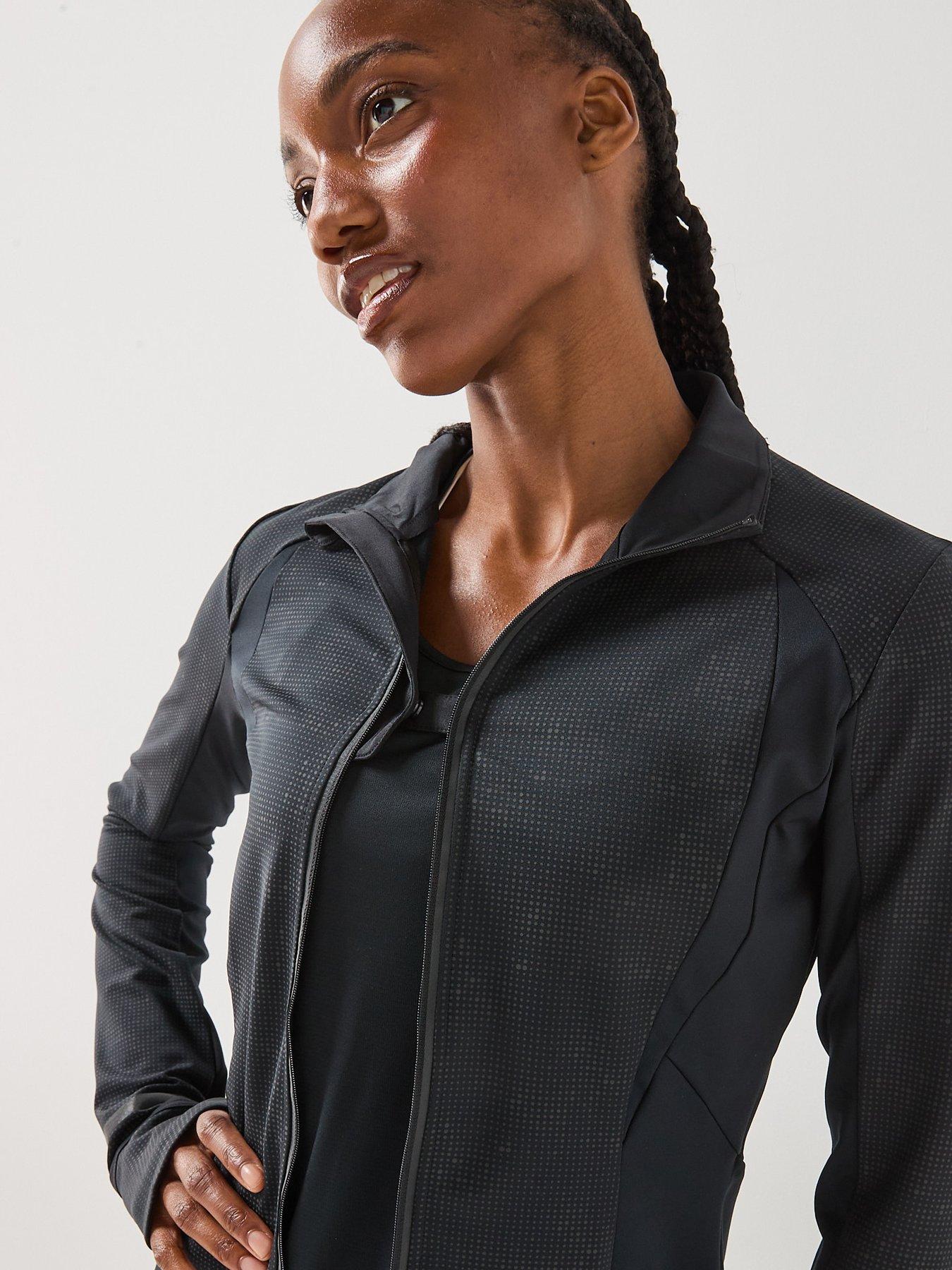 Image 5 of 6 of Ronhill Womens Tech Reflect Lux Reflective Full Zip Pocket Jacket - Black