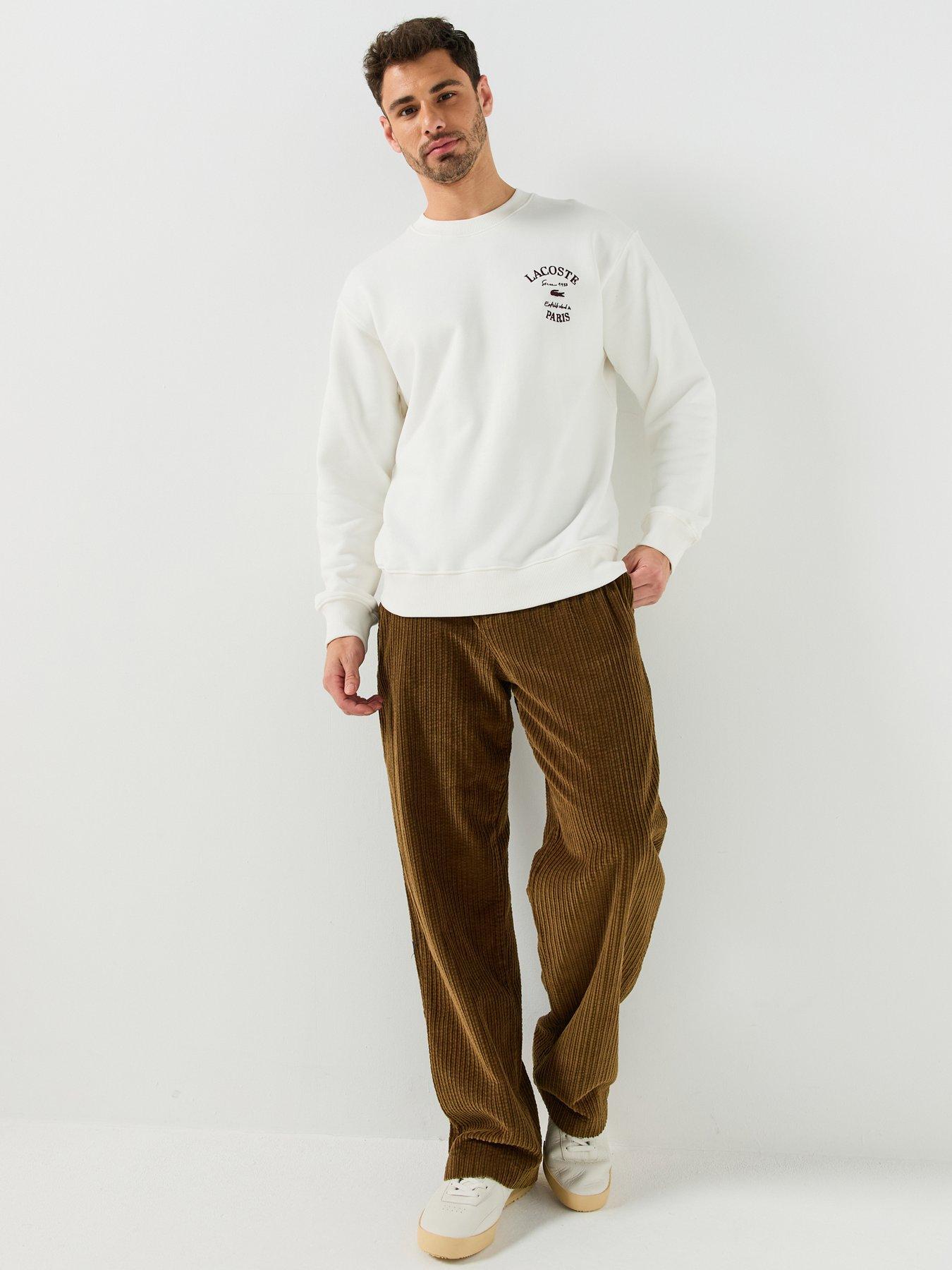 Image 1 of 6 of Lacoste Relaxed Fit Elasticated Corduroy Trousers - Brown