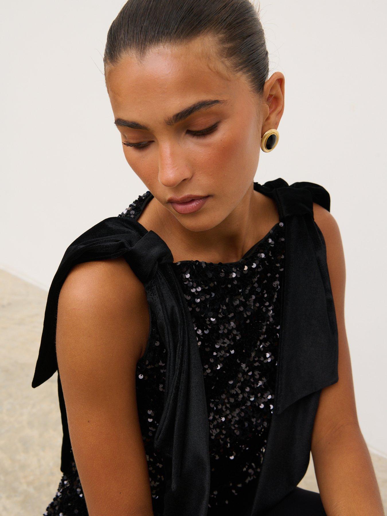 Image 4 of 4 of Pretty Lavish Kate Sequin Bow Detail Top - Black