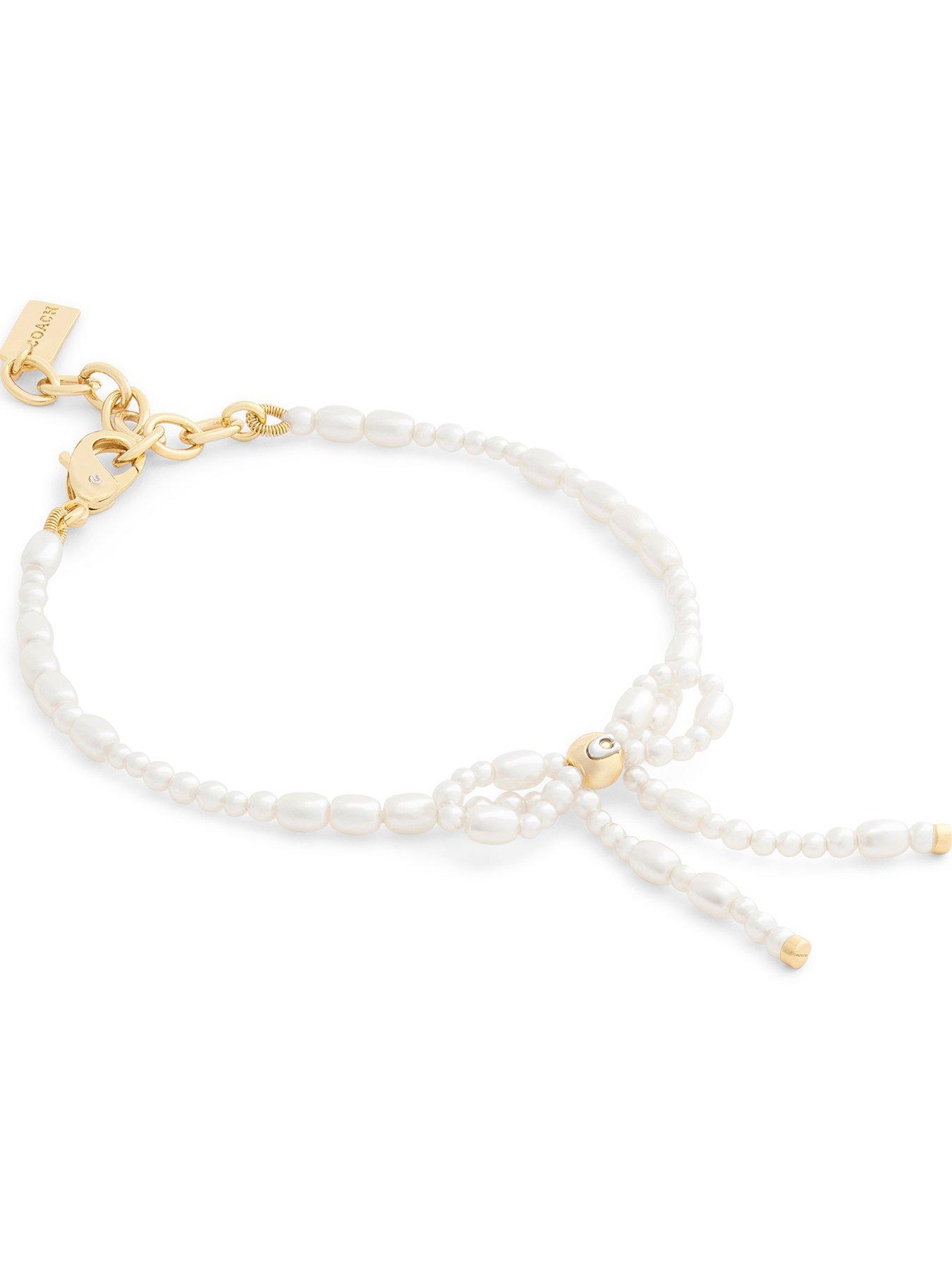 Image 2 of 3 of COACH Pearl Bow Flex Bracelet