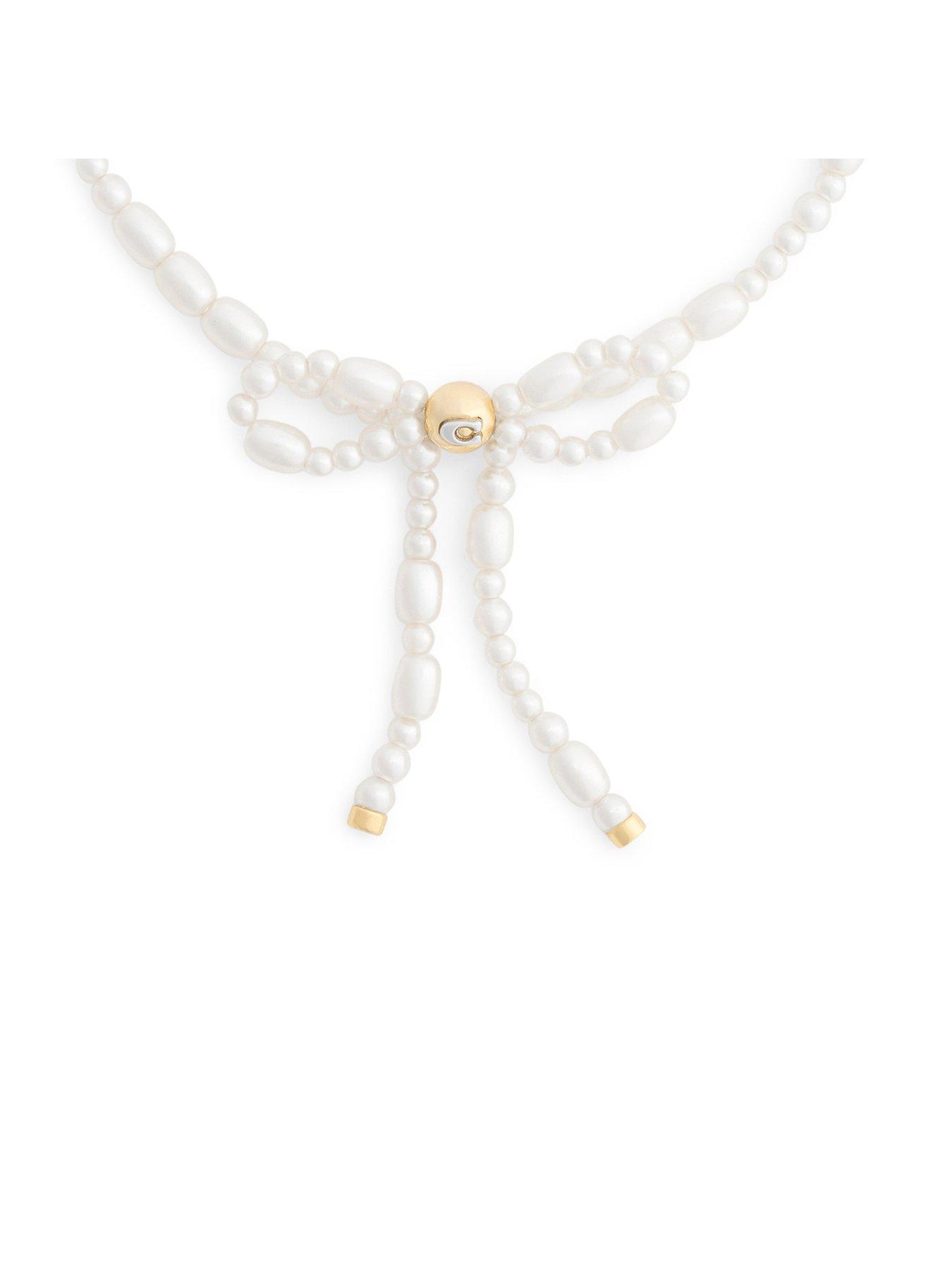 Image 3 of 3 of COACH Pearl Bow Flex Bracelet