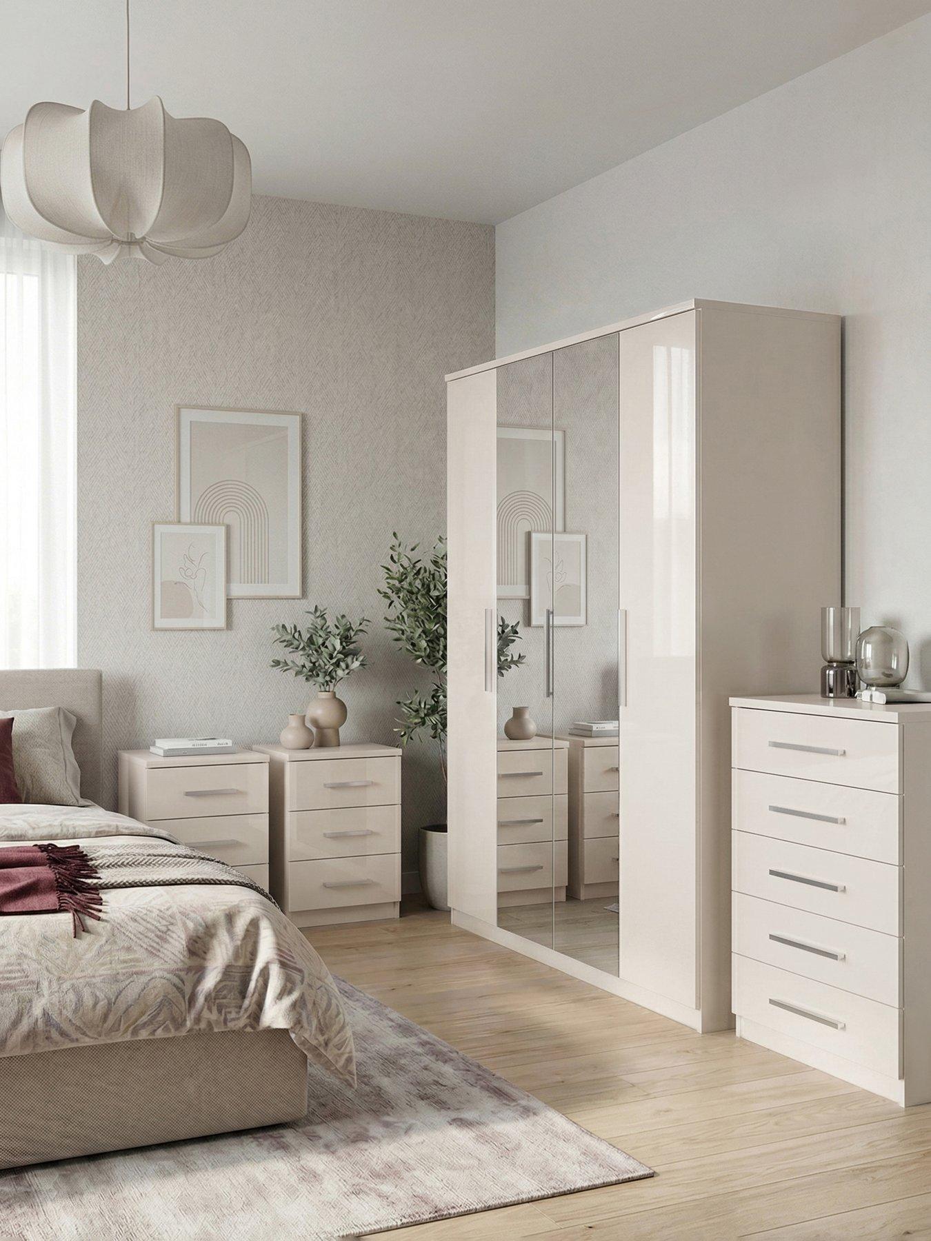 The Very Collection Prague 4 Piece Package - 4 Door Mirrored Wardrobe, 5 Drawer Chest and Pair of 3 Drawer Bedside Chests - White Gloss