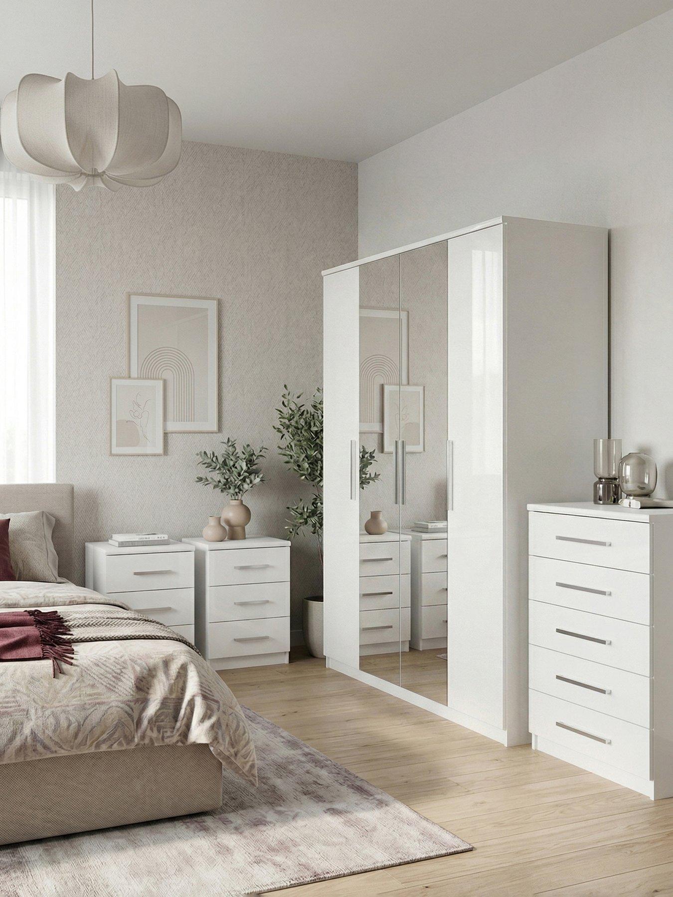 The Very Collection Prague 4 Piece Package - 4 Door Mirrored Wardrobe, 5 Drawer Chest and Pair of 3 Drawer Bedside Chests - White Gloss