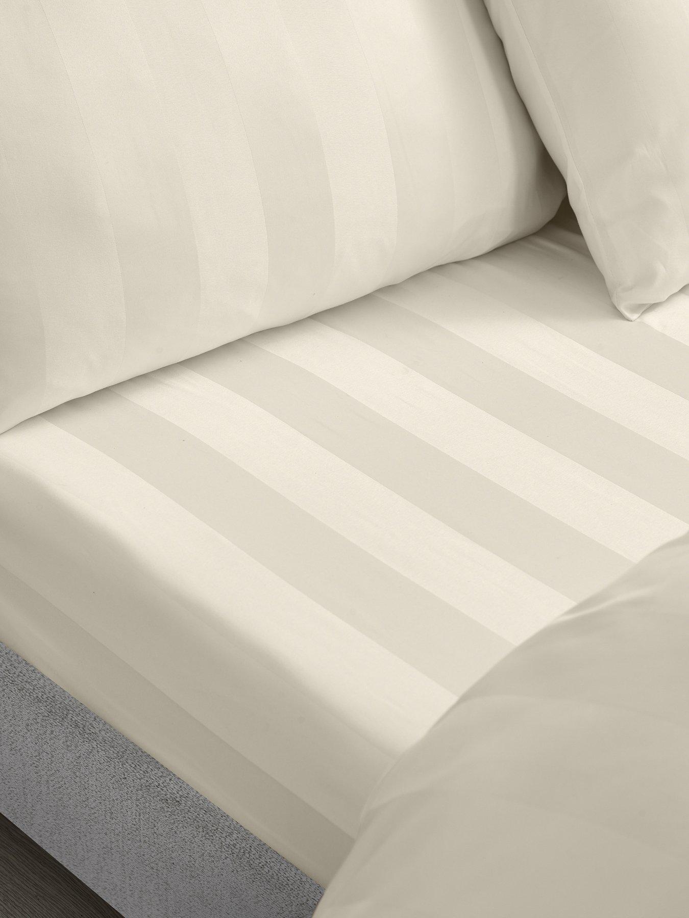 Image 1 of 3 of Catherine Lansfield So Soft Satin Stripe Fitted Sheet Cream