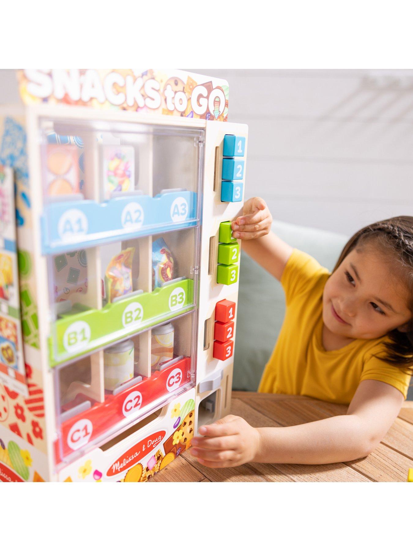Image 5 of 7 of Melissa & Doug Light-Up Coin Drop Vending Machine Toy