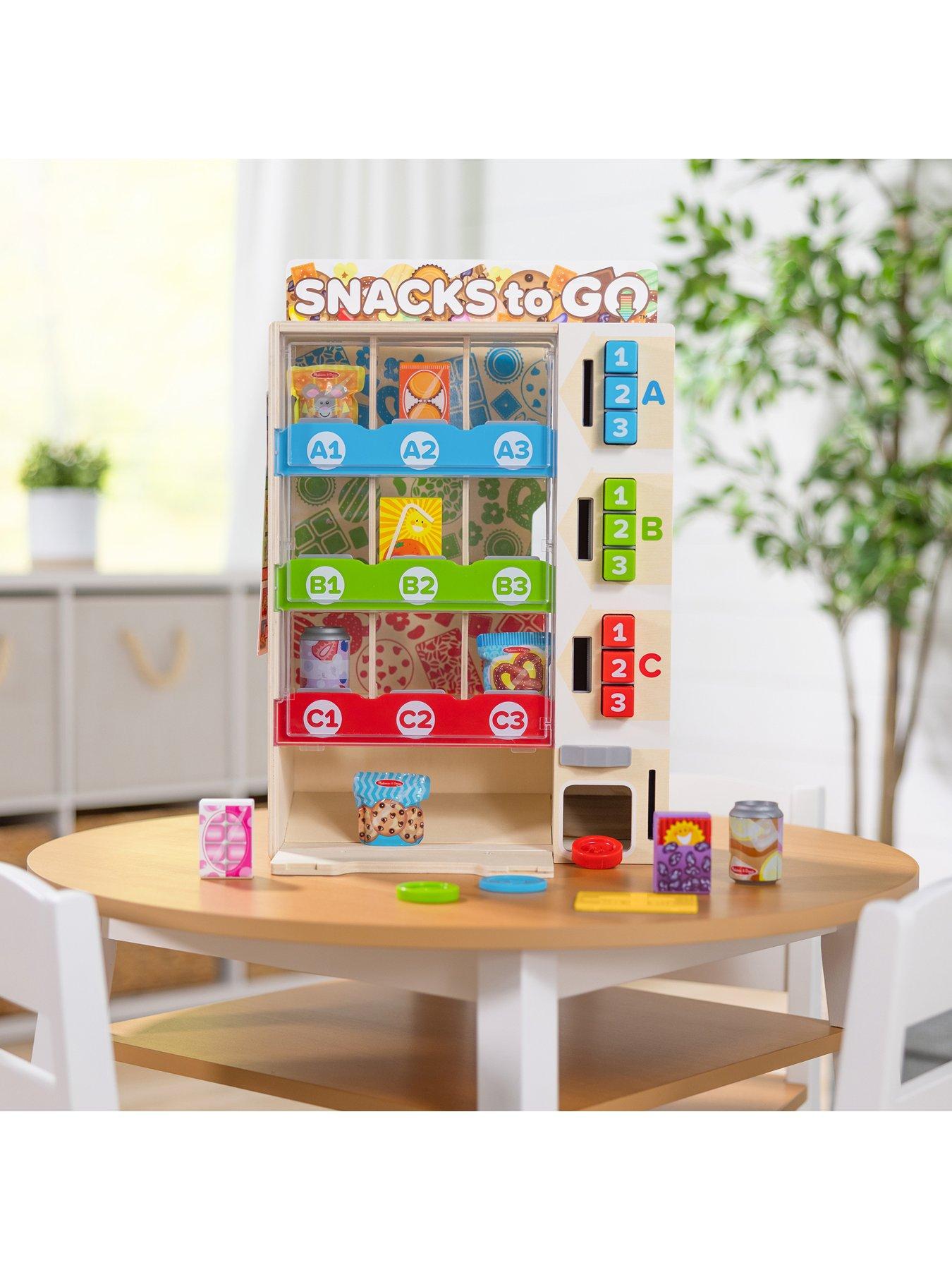 Image 6 of 7 of Melissa & Doug Light-Up Coin Drop Vending Machine Toy