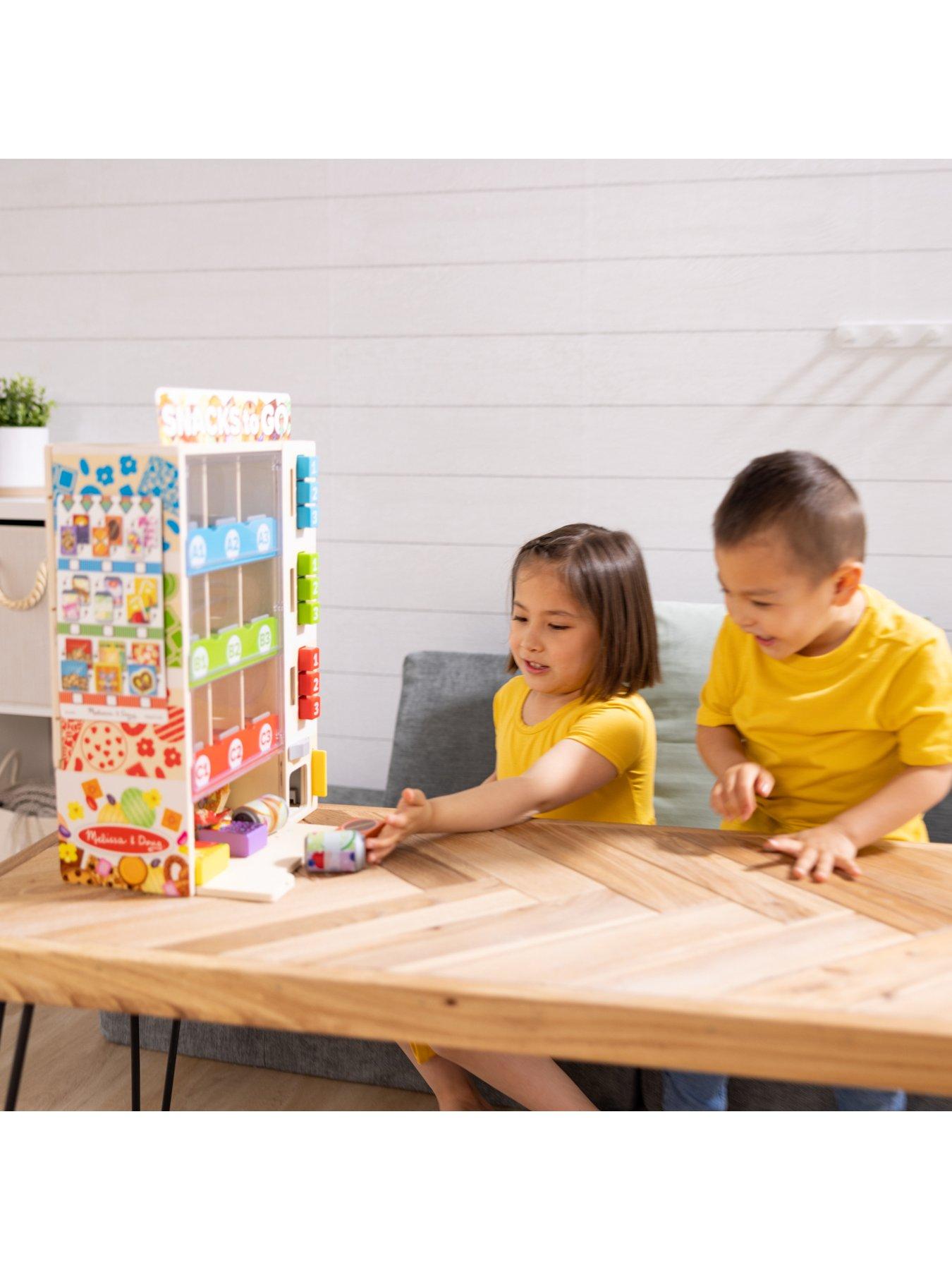 Image 7 of 7 of Melissa & Doug Light-Up Coin Drop Vending Machine Toy