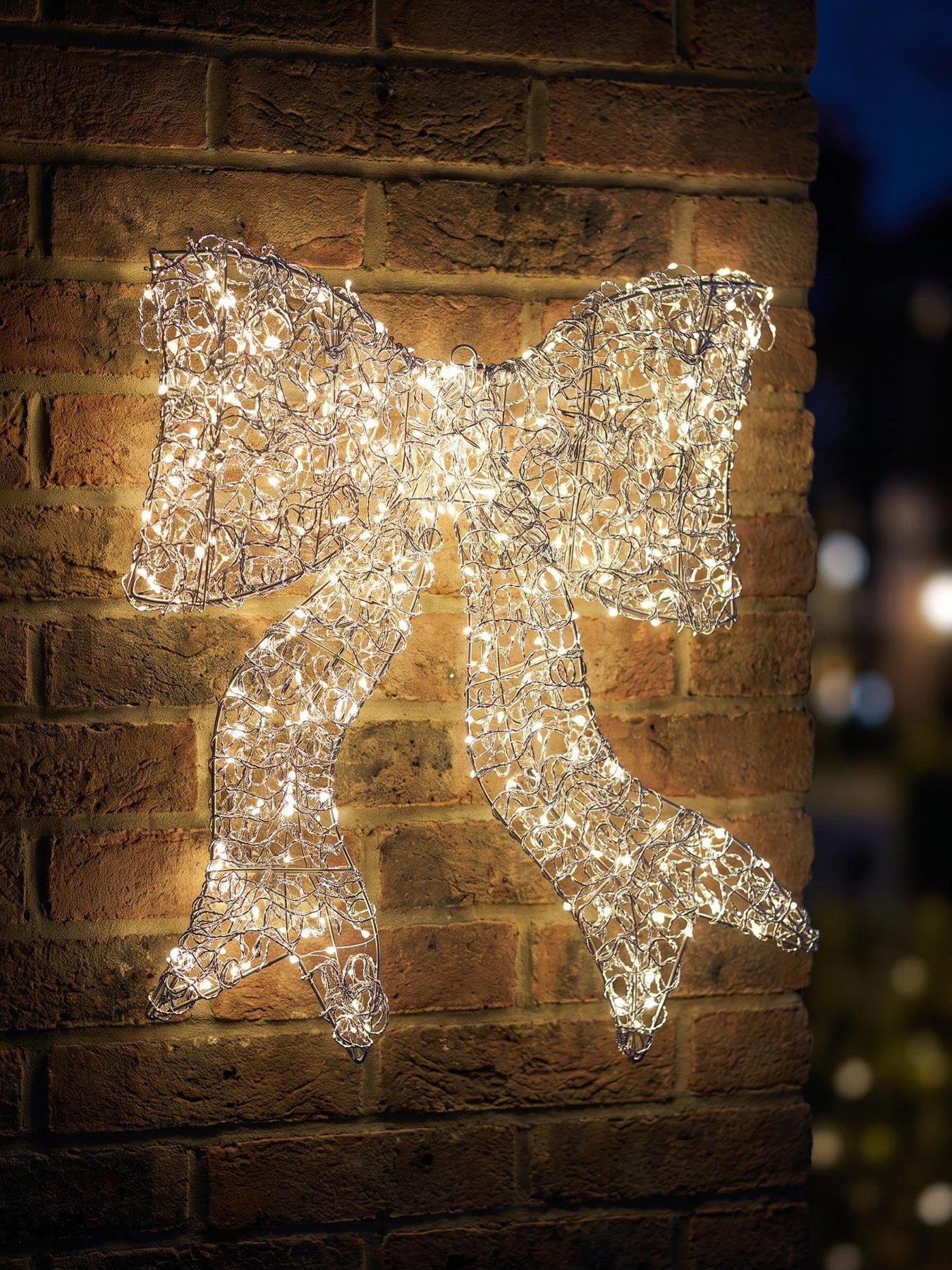 Festive Lit Spiral Silver Metal Wire Twirl Bow Christmas Light - 57 cm