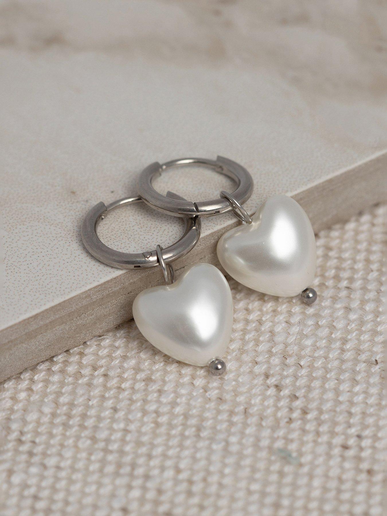 Image 4 of 5 of The Love Collection Stainless Steel Heart Pearl Huggies
