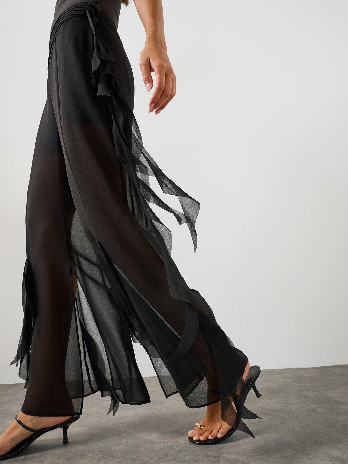 Image 1 of 6 of AllSaints Minna Flared Frill Detail Trousers - Black