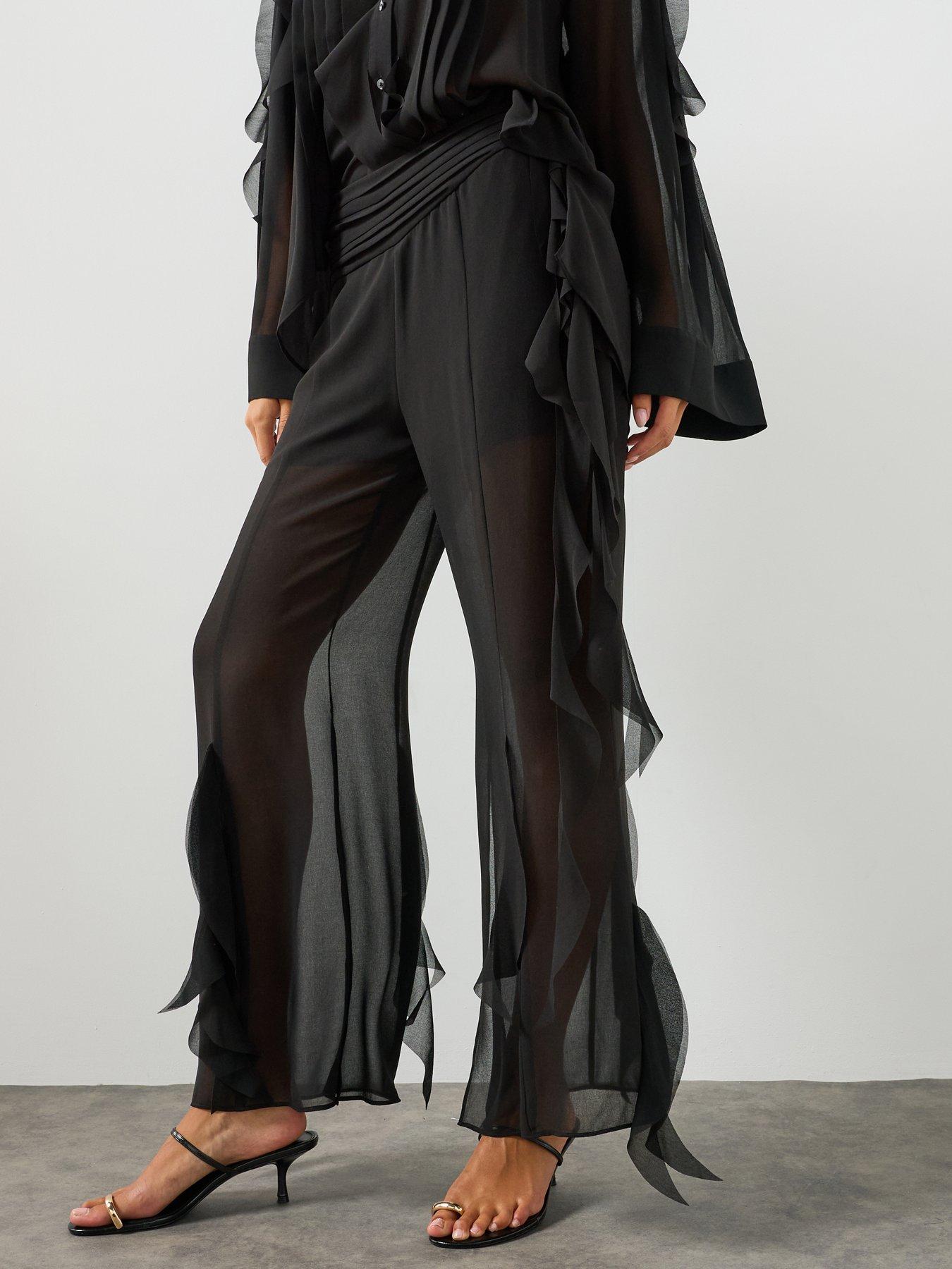 Image 6 of 6 of AllSaints Minna Flared Frill Detail Trousers - Black