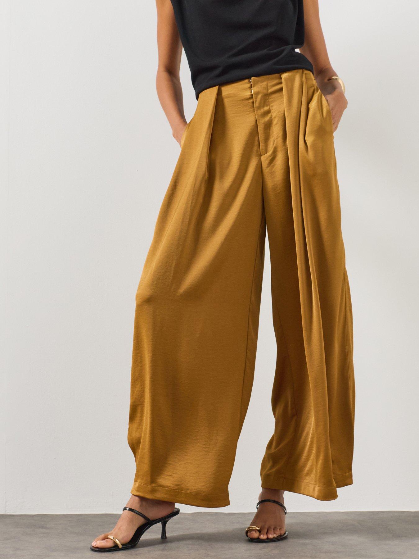 Image 1 of 5 of AllSaints Lola Cocoon Legged Pleated Trousers - Brown