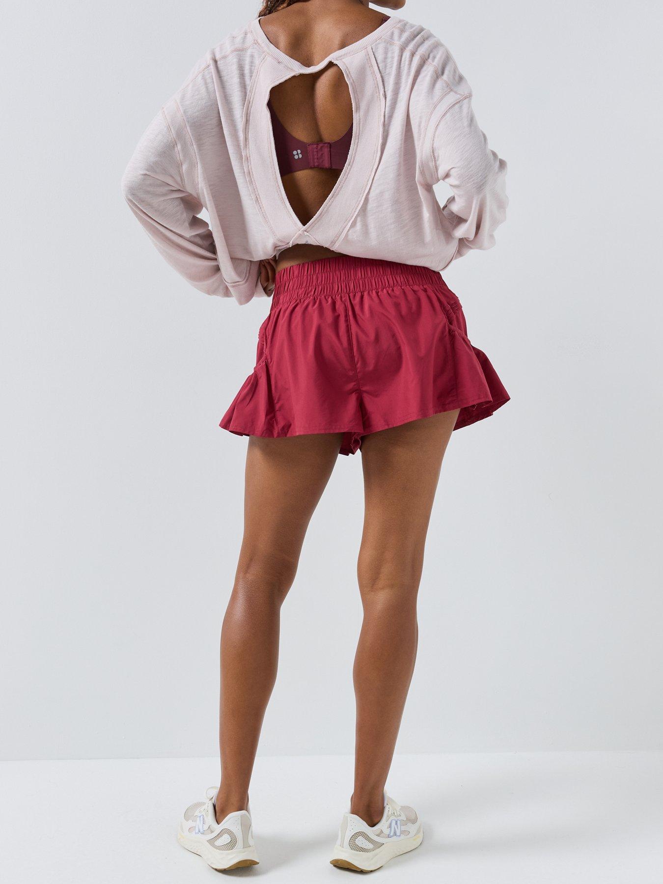 Image 2 of 6 of FP Movement FP Movement Get Your Flirt On Ruffle Hem Sports Shorts - Red