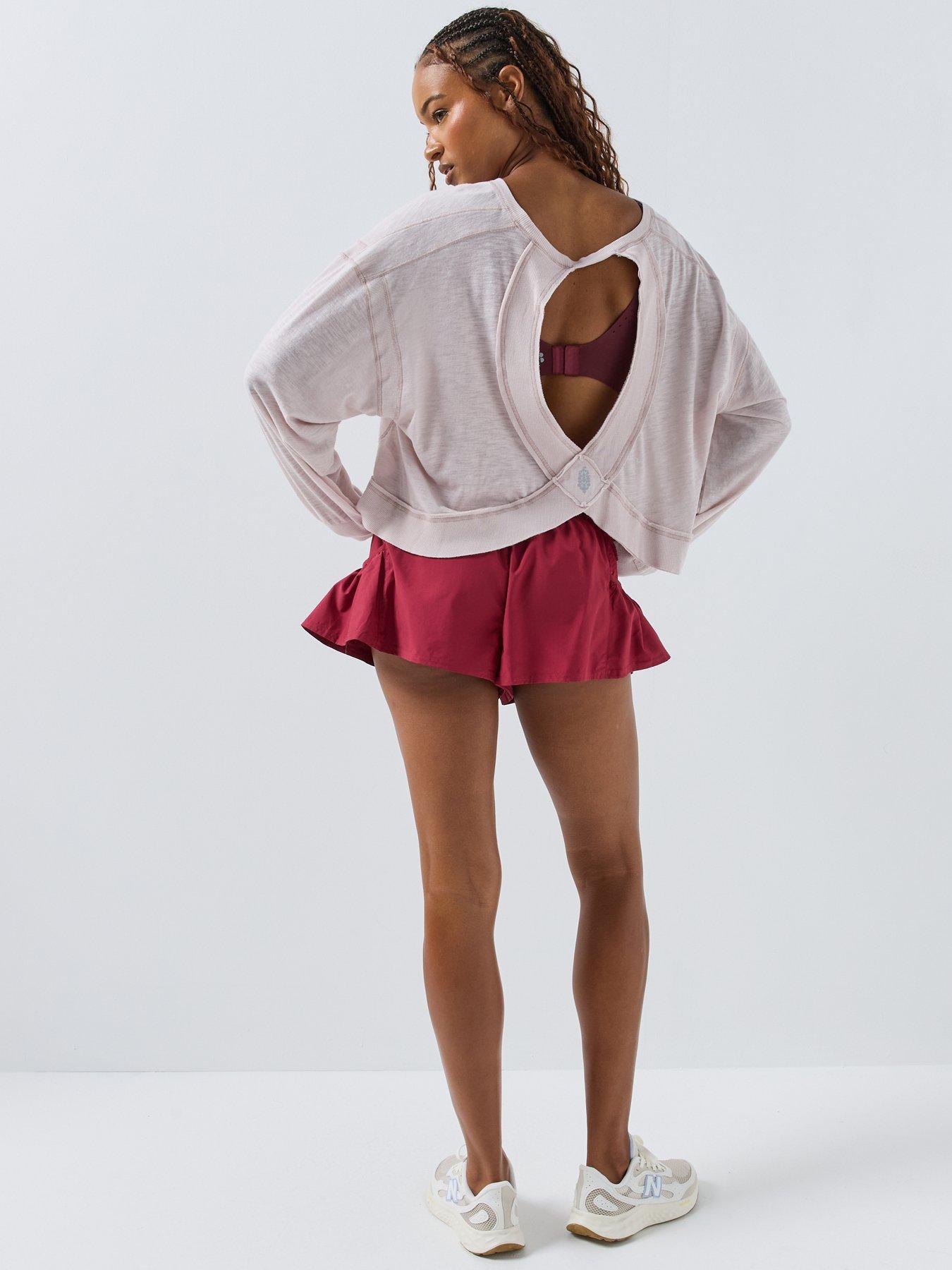 Image 5 of 6 of FP Movement FP Movement Get Your Flirt On Ruffle Hem Sports Shorts - Red