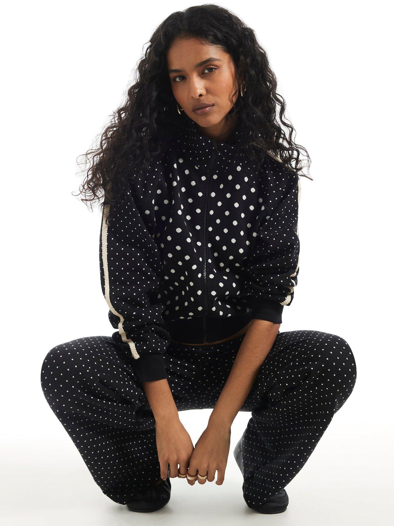 Image 1 of 6 of River Island Long Sleeve Polka Dot Jacquard Track Jacket Coord - Black