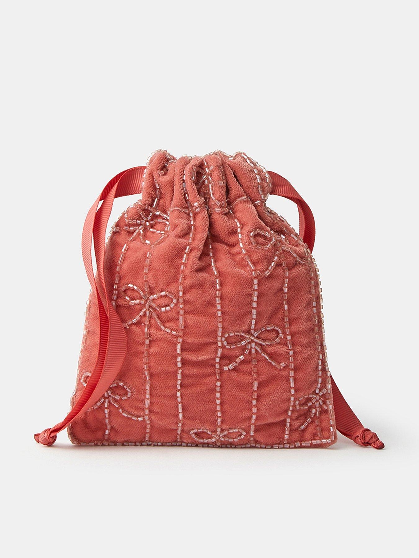 Image 1 of 3 of Accessorize Womens Velvet Beaded Bow Drawstring Bag - Pink