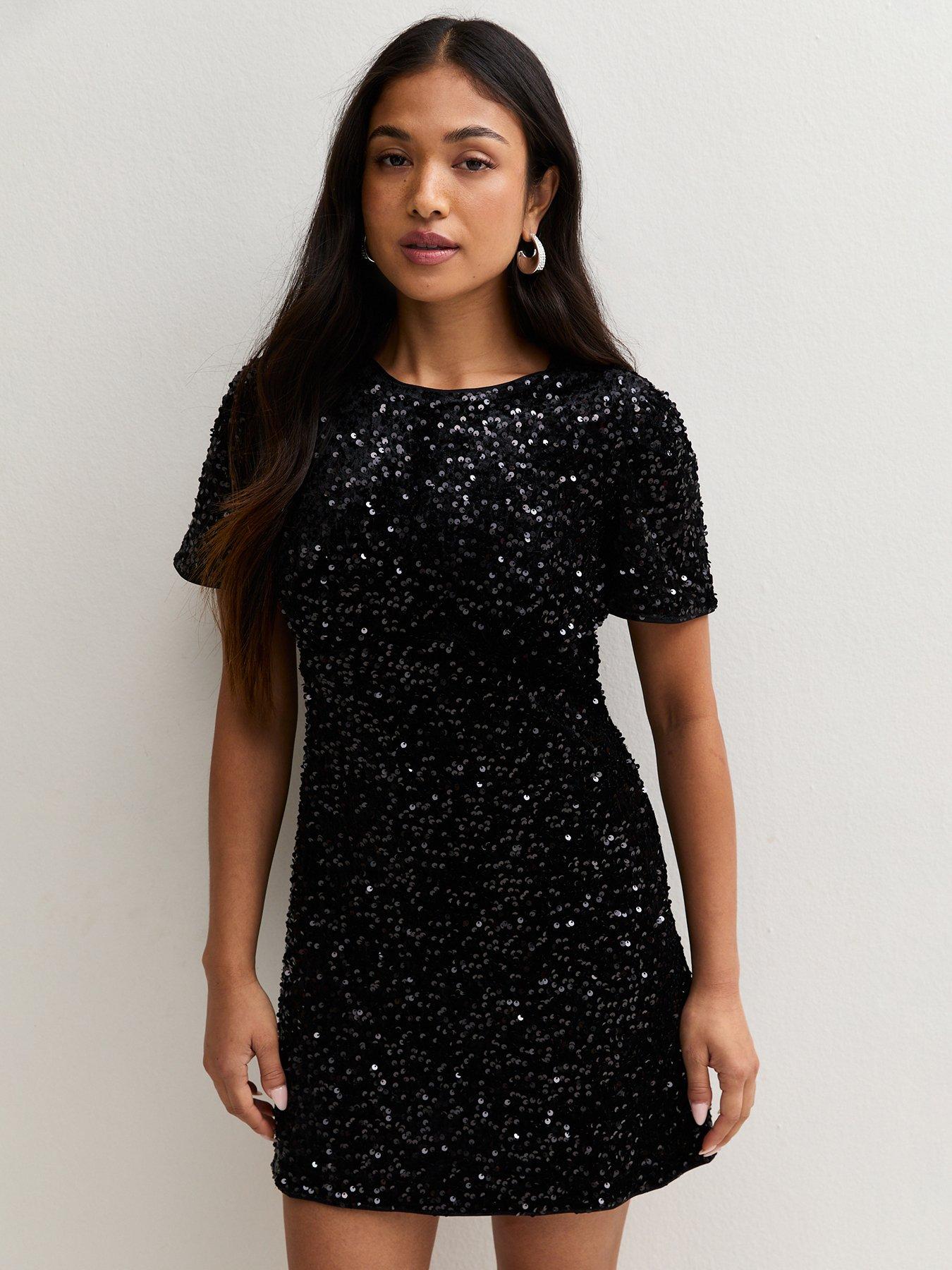 Image 1 of 5 of New Look Petite Black Sequin Short Sleeve Mini Shift Dress
