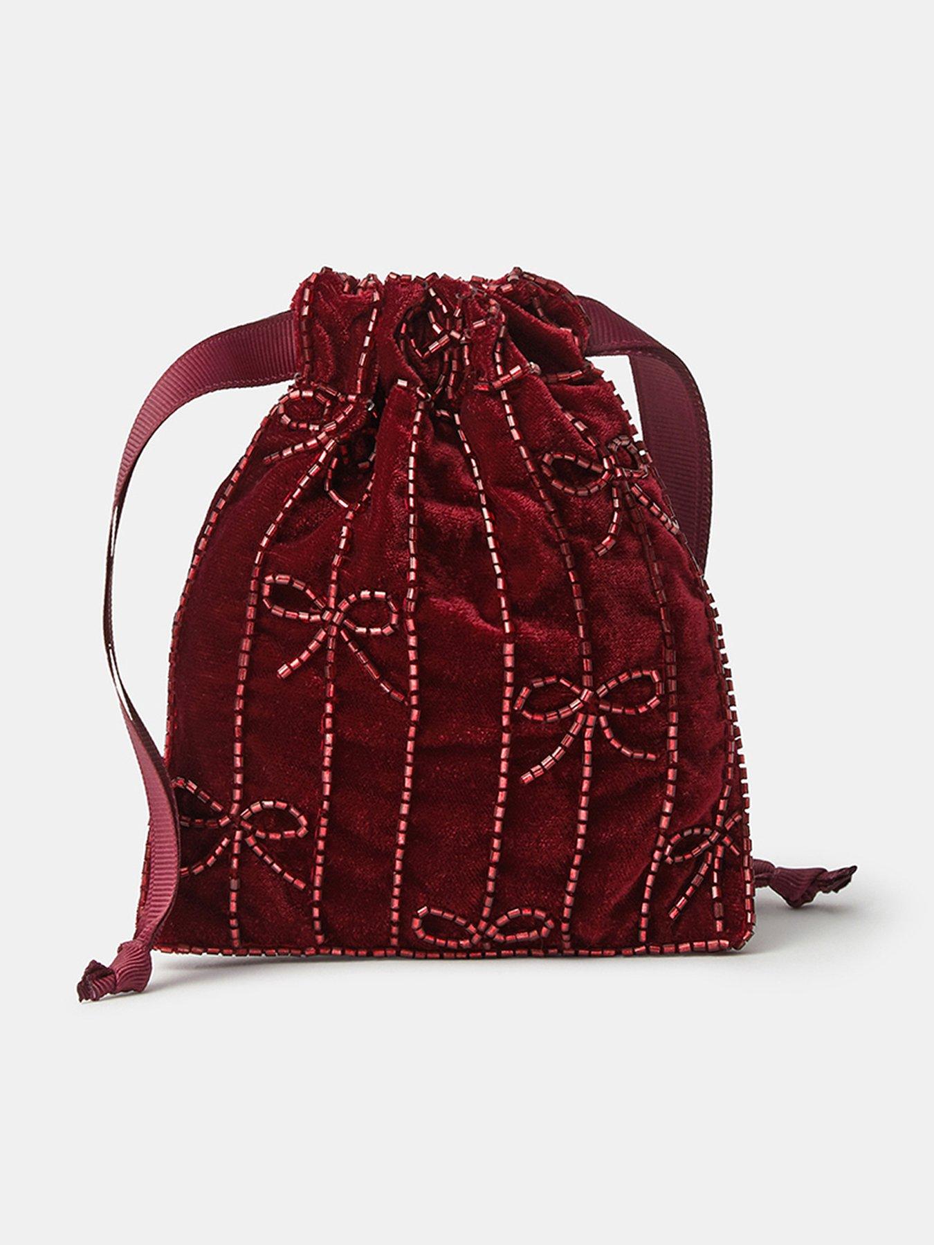 Image 1 of 3 of Accessorize Womens Velvety Beaded Bow Drawstring Bag - Pink