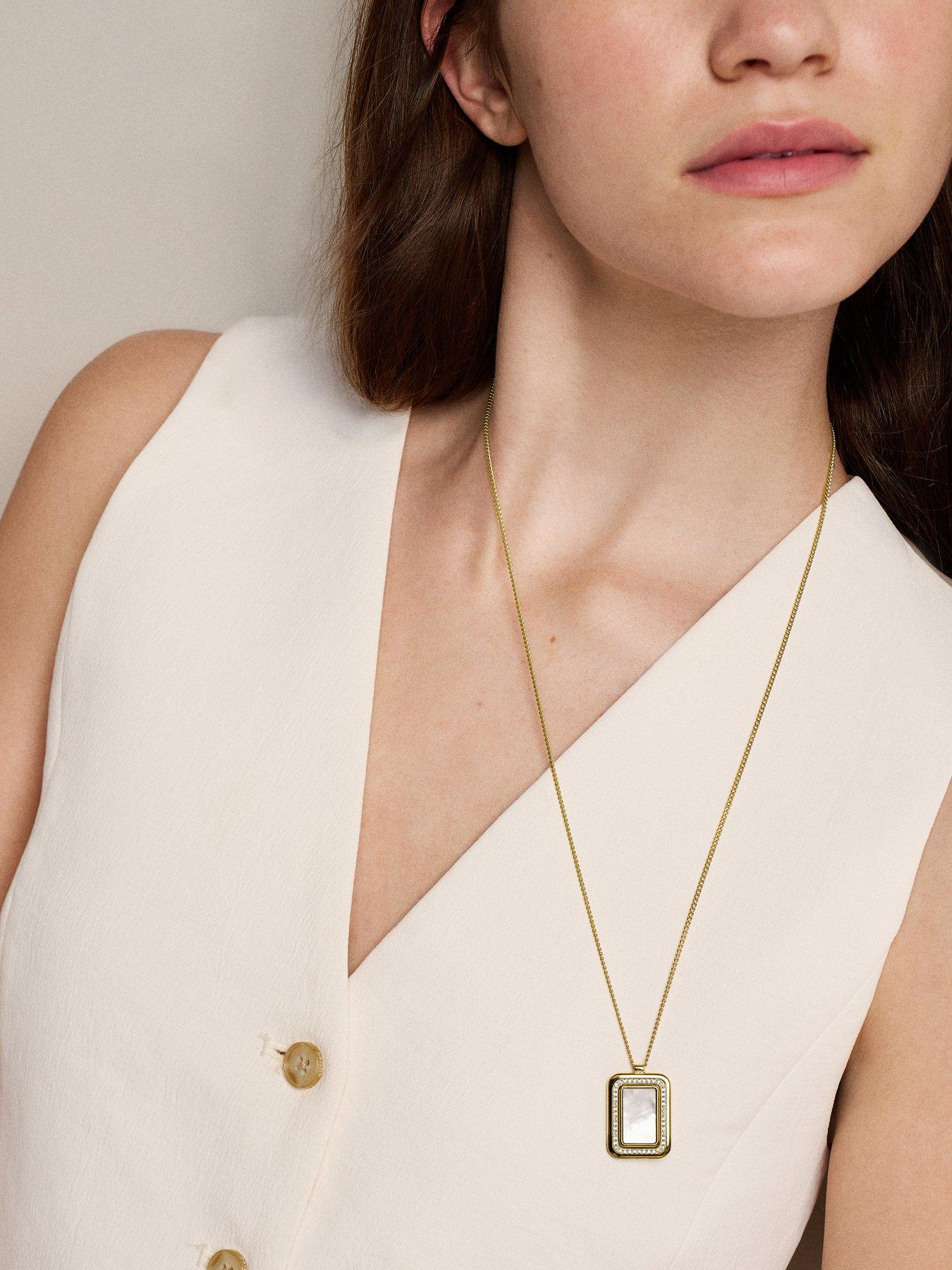 Image 3 of 7 of Fossil Raquel Mother-of-Pearl Spinning Pendant Necklace