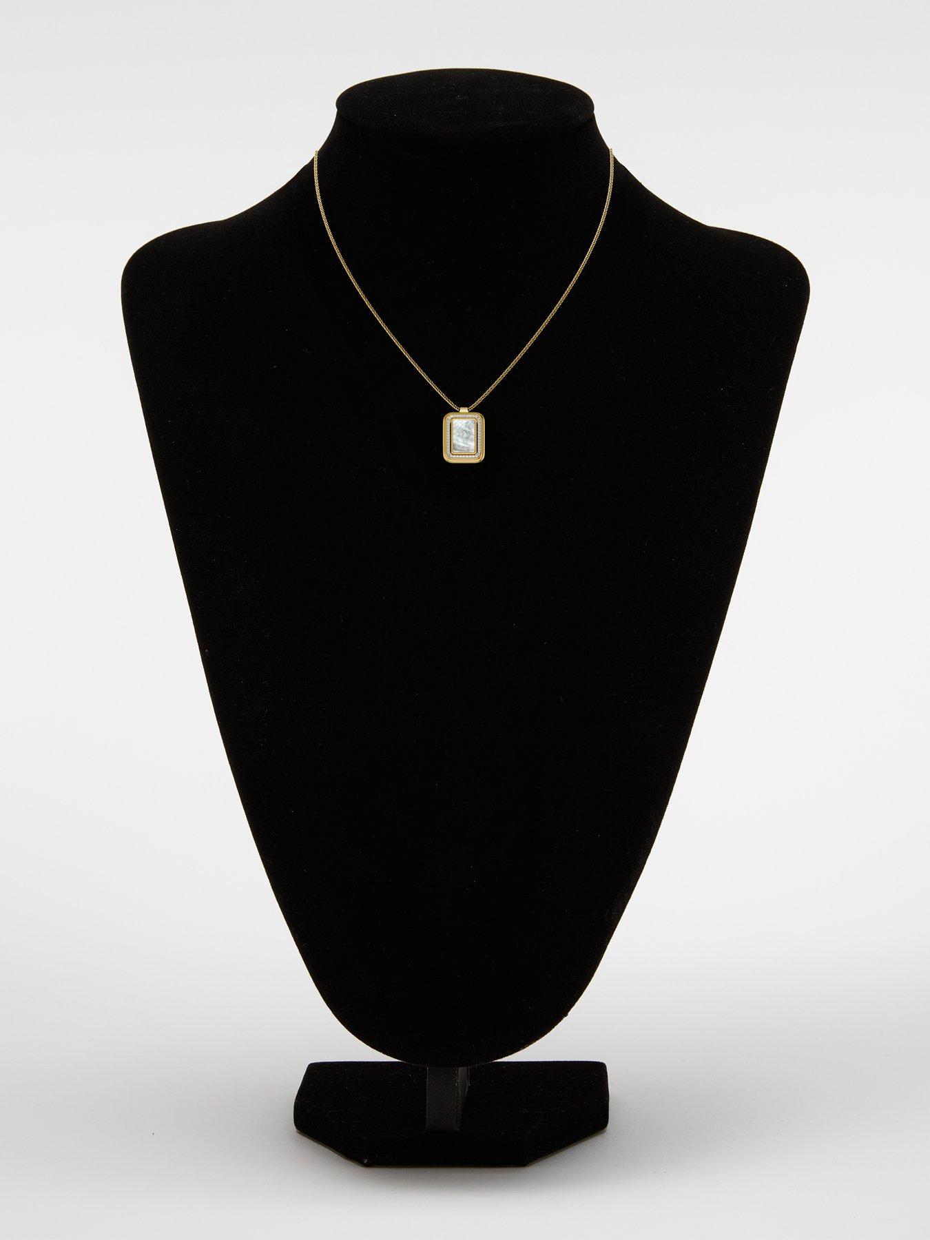 Image 7 of 7 of Fossil Raquel Mother-of-Pearl Spinning Pendant Necklace