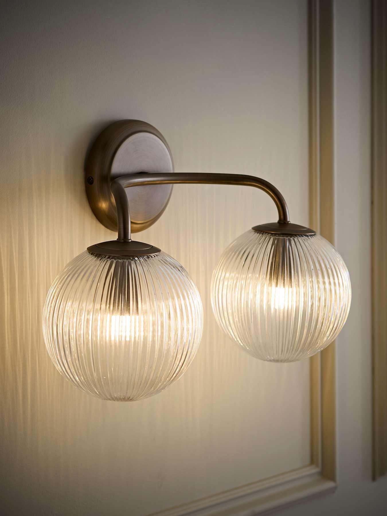 Image 1 of 6 of ValueLights Kempton Brushed Brass Ribbed Glass 2 Arm Wall Light and Warm White Bulb
