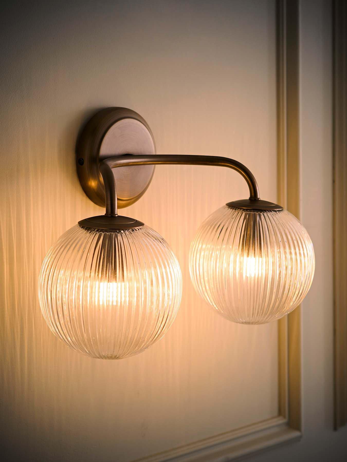 Image 3 of 6 of ValueLights Kempton Brushed Brass Ribbed Glass 2 Arm Wall Light and Warm White Bulb