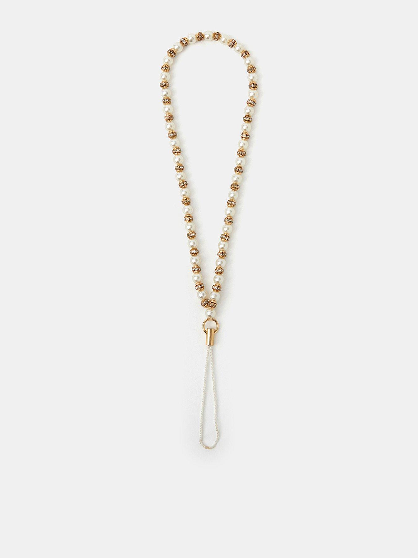 Image 1 of 2 of Accessorize Womens Pearl-Look Beads Gold-Tone Wrist Strap Phone Charm - Cream