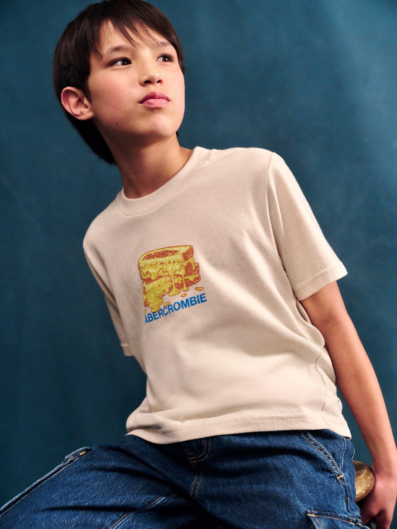 Image 1 of 5 of Abercrombie & Fitch Boys Grilled Cheese Graphic Logo T-Shirt - Beige